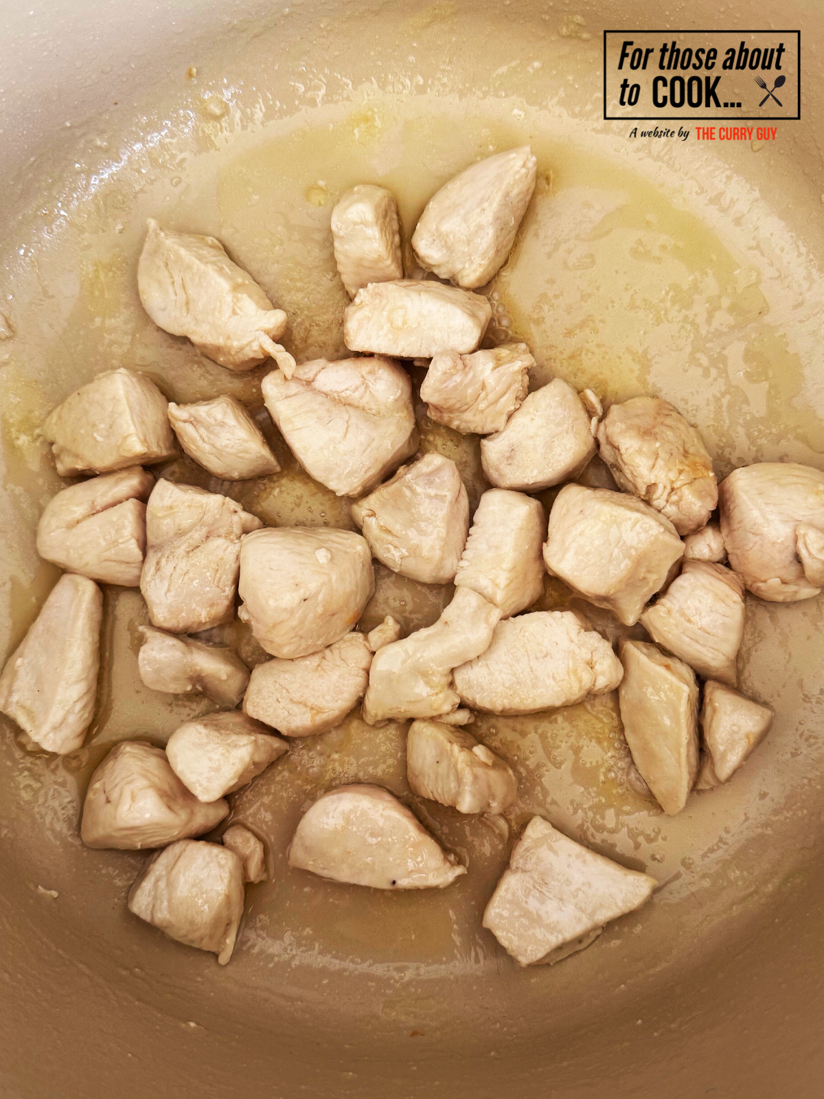 Chicken cooking in pot for risotto