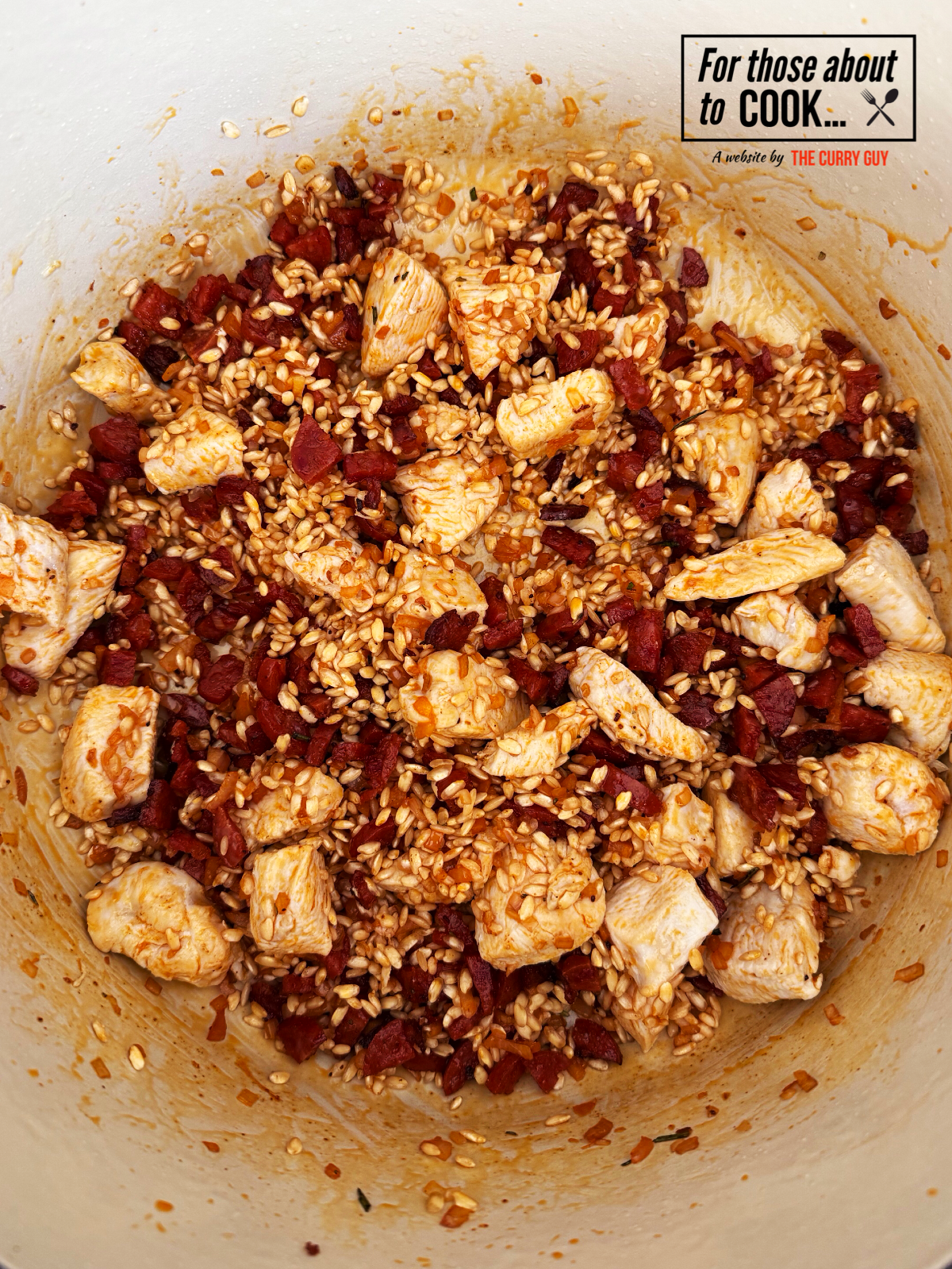 Chicken and chorizo added back into the pot