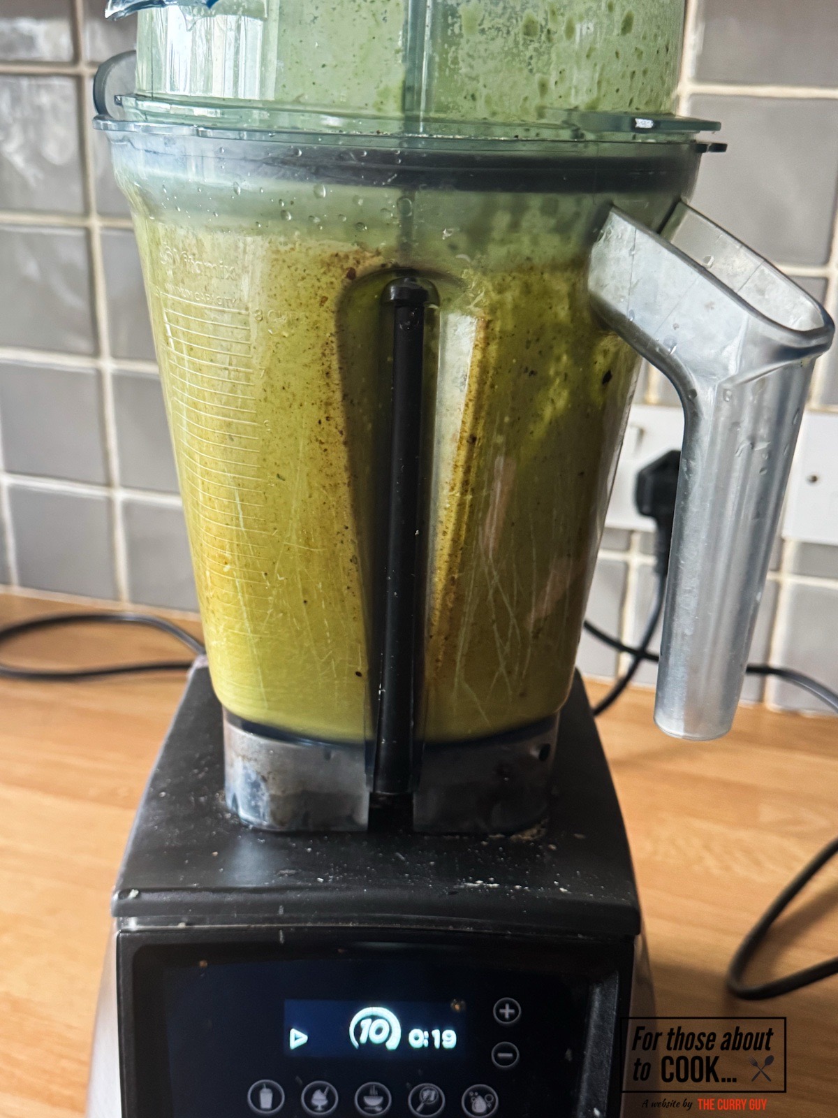 Blending the salad dressing ingredients together in a blender.