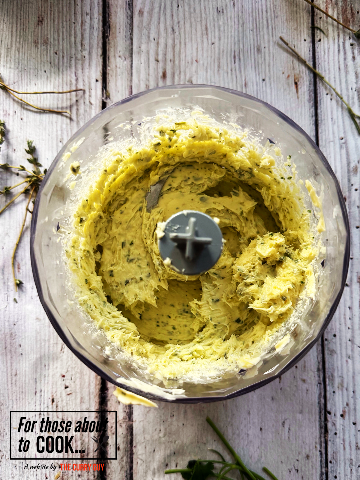 Blended garlic butter in a food processor