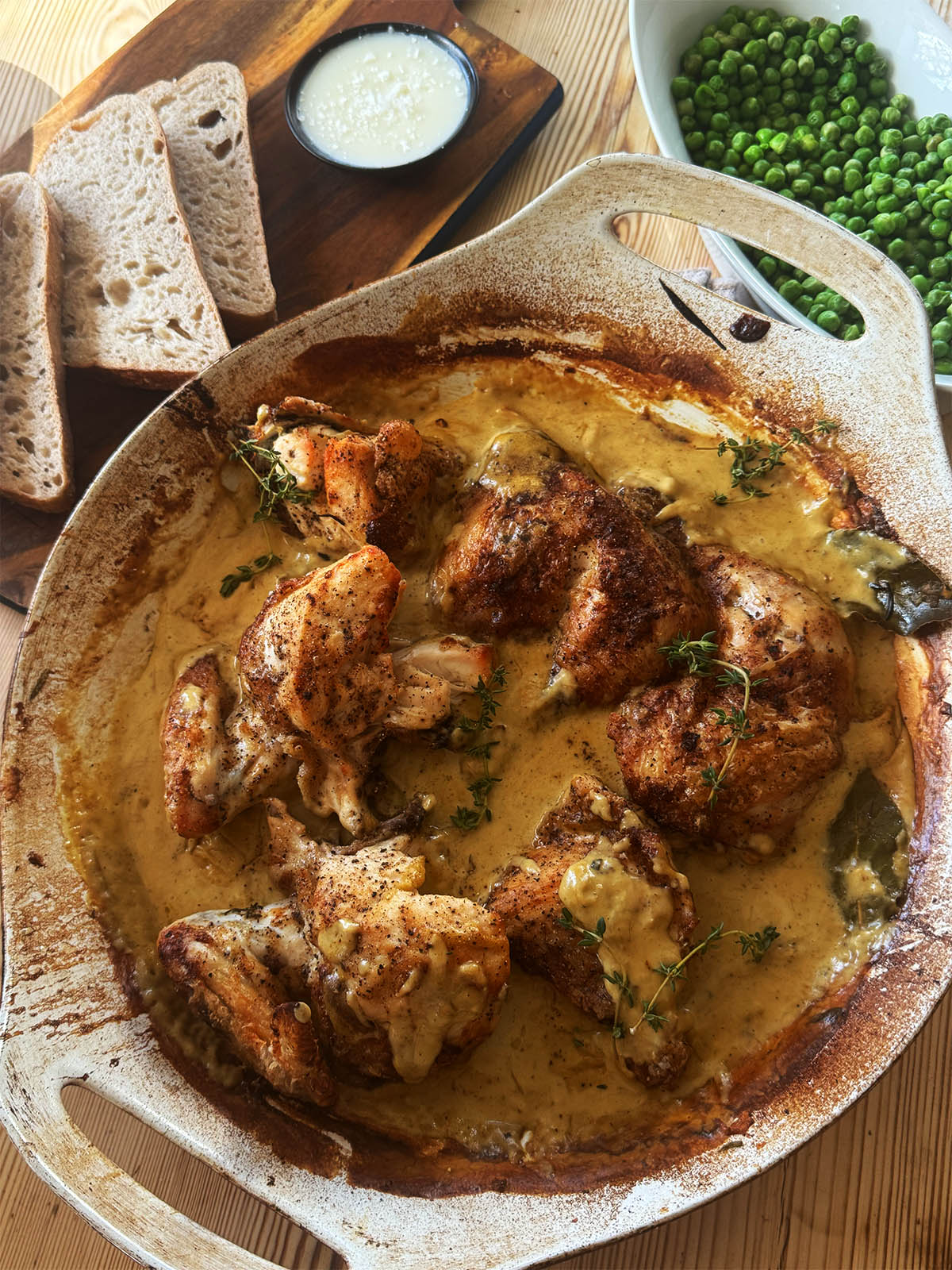 Returning the chicken to the smooth blended sauce.