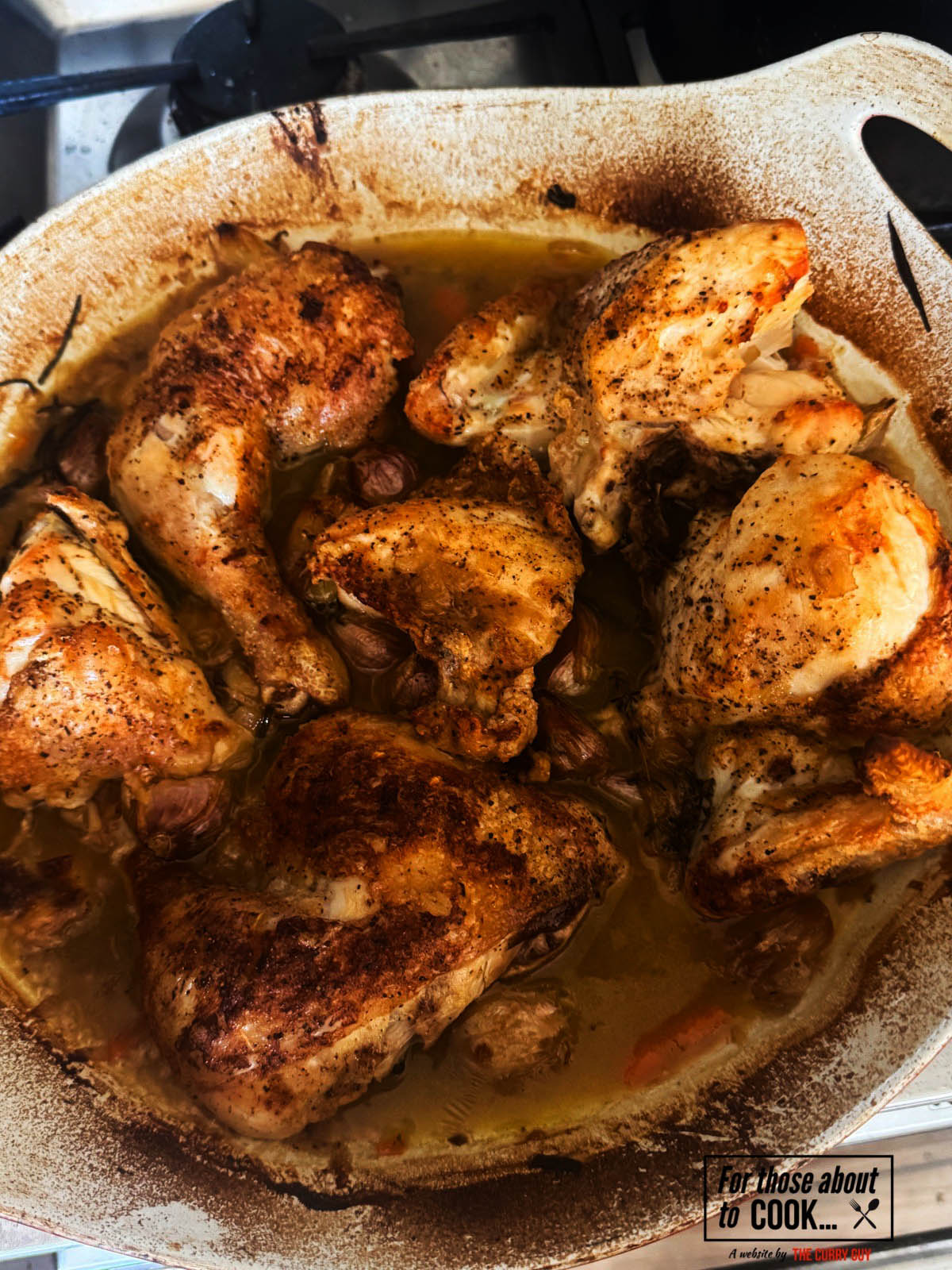 The chicken and sauce after roasting in the oven.