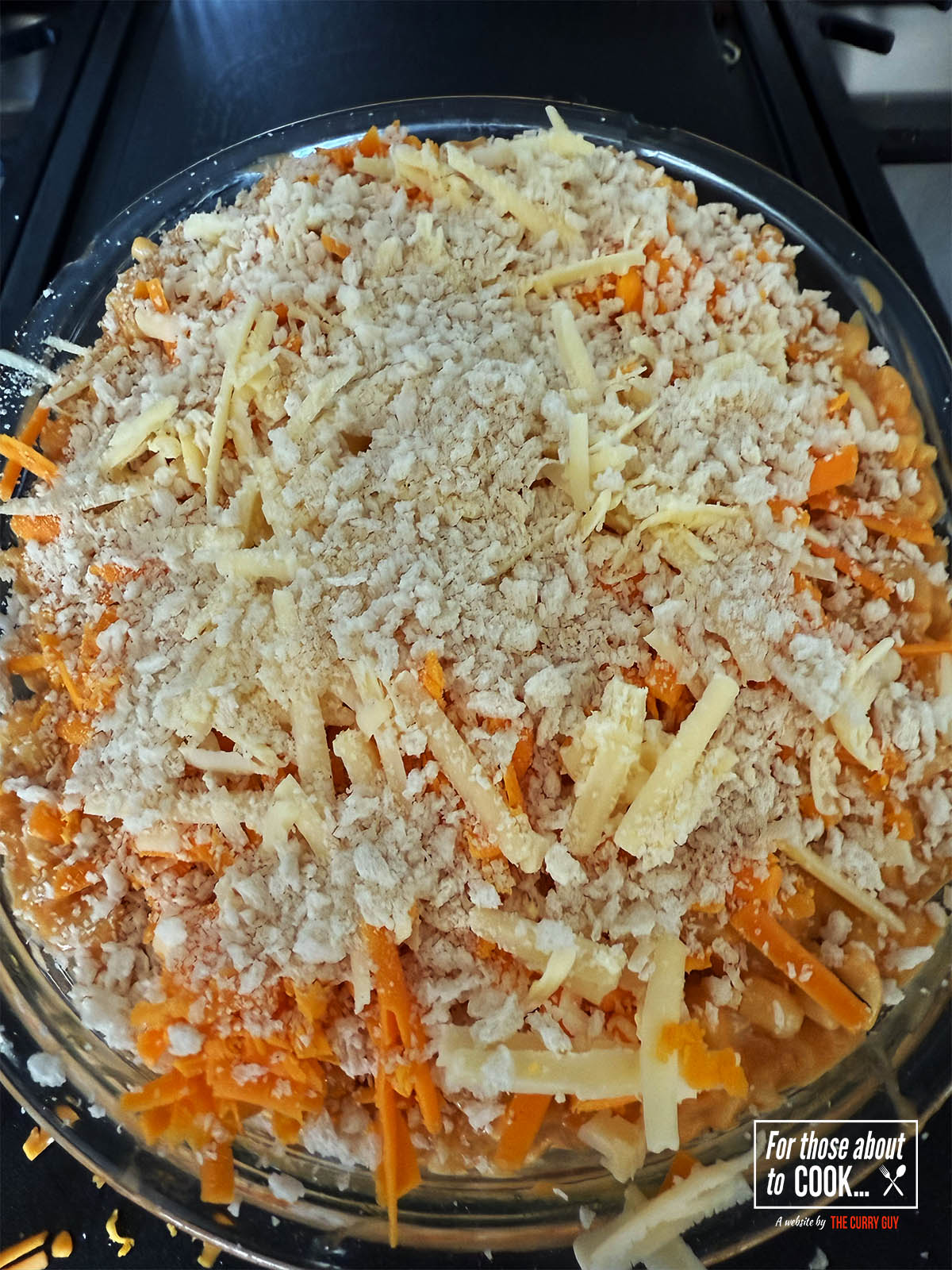 Topping with cheese and breadcrumbs