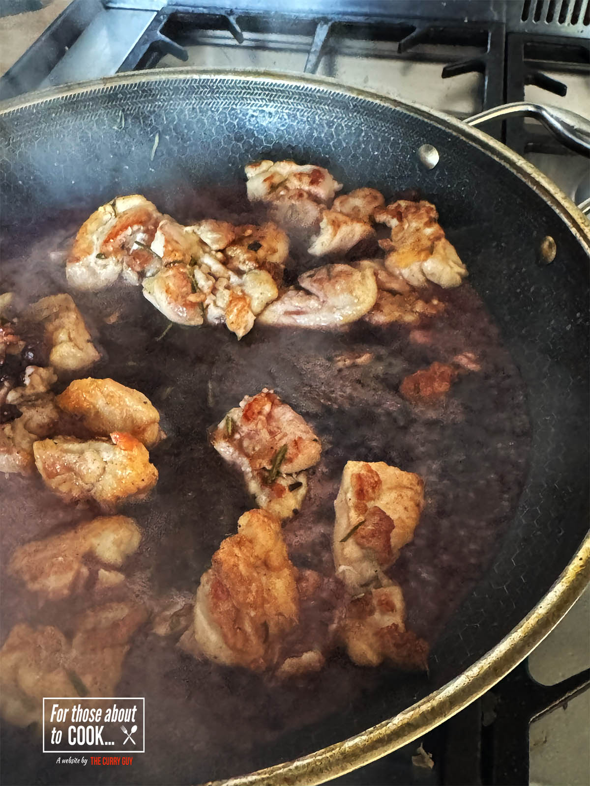 Pouring the wine into the pan.