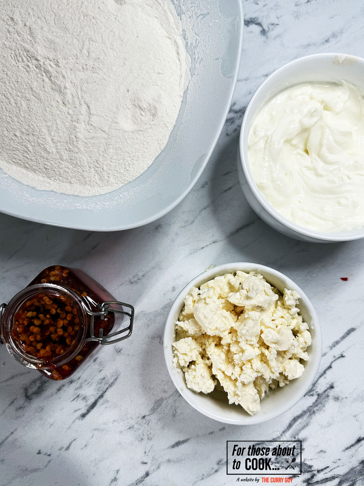 Ingredients for feta and hot honey flatbreads