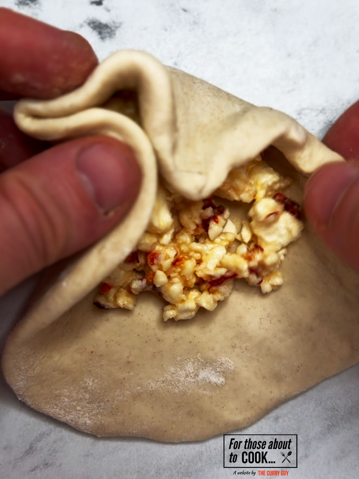 Stuffed flatbreads folded and sealed