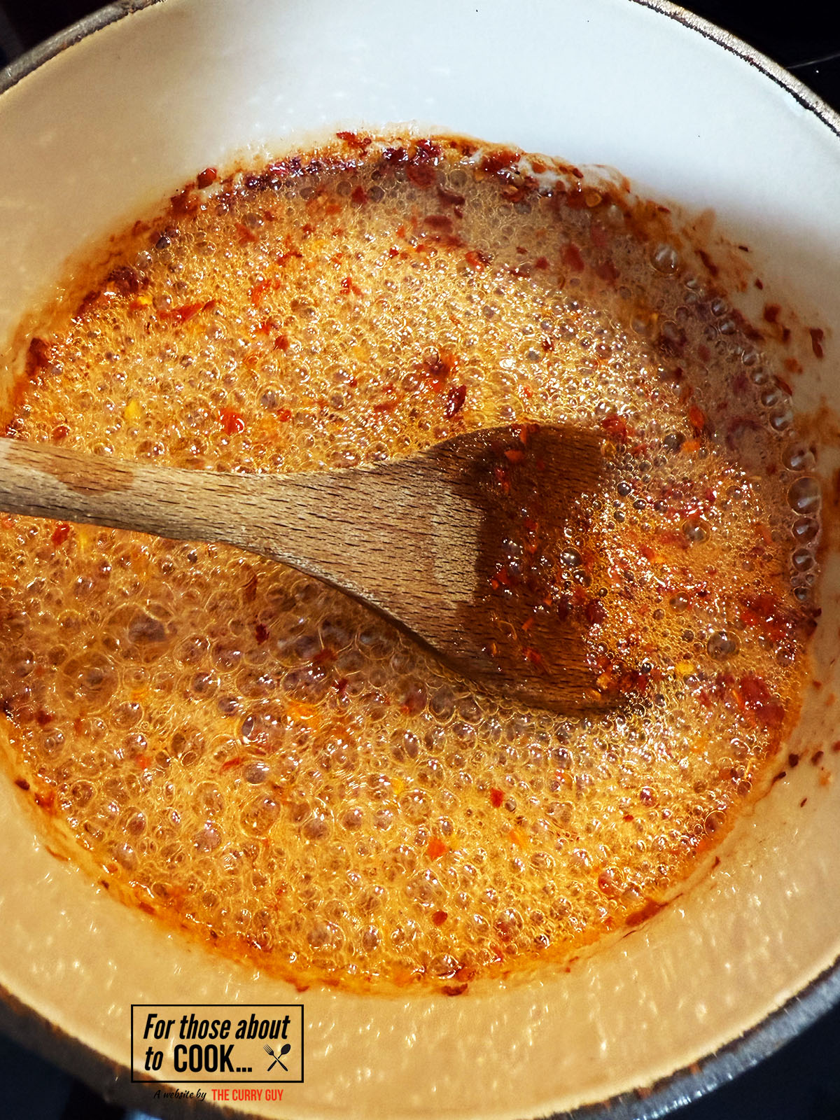chili boiling in a pan