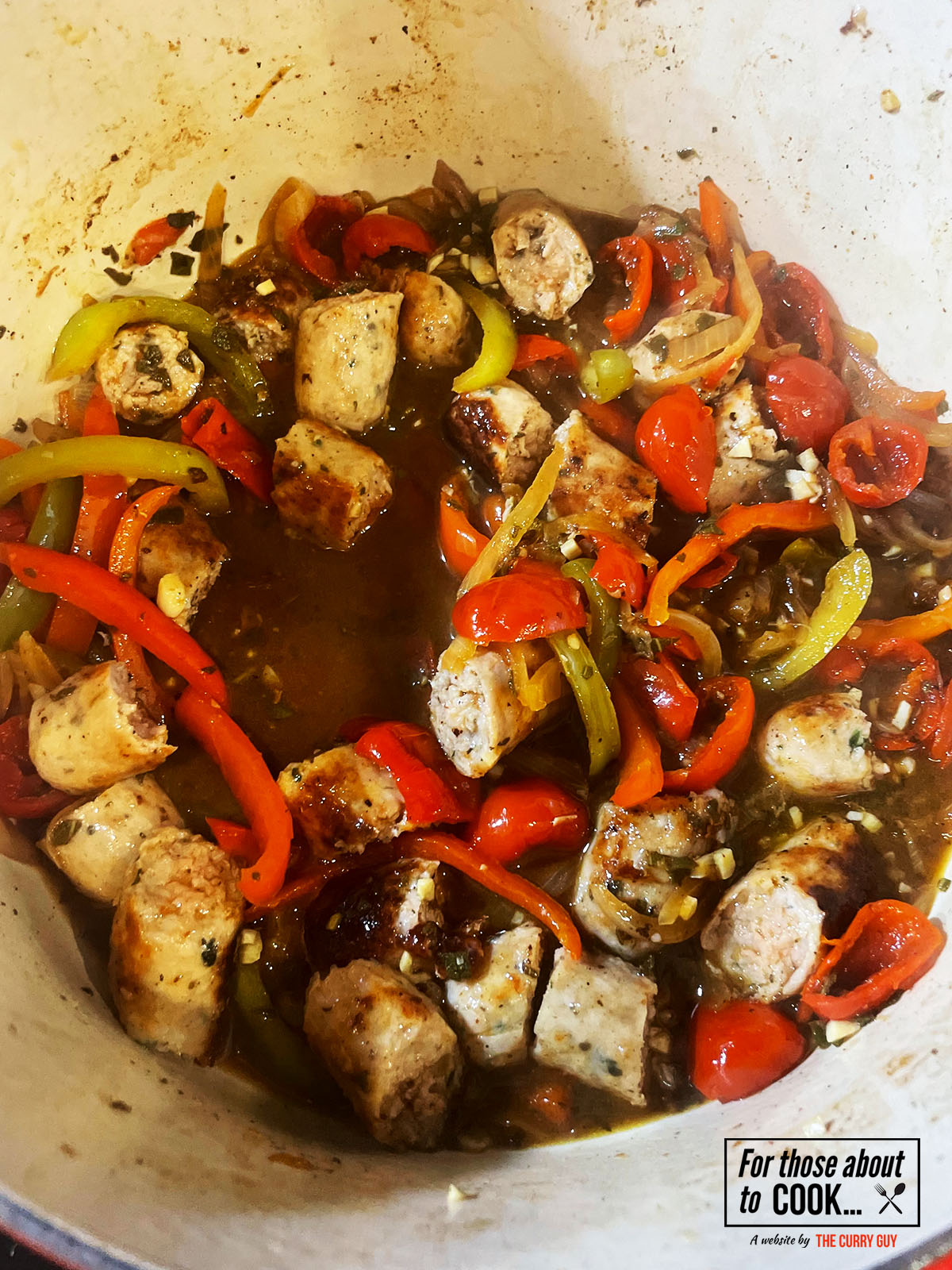 returning the sausages to the pan