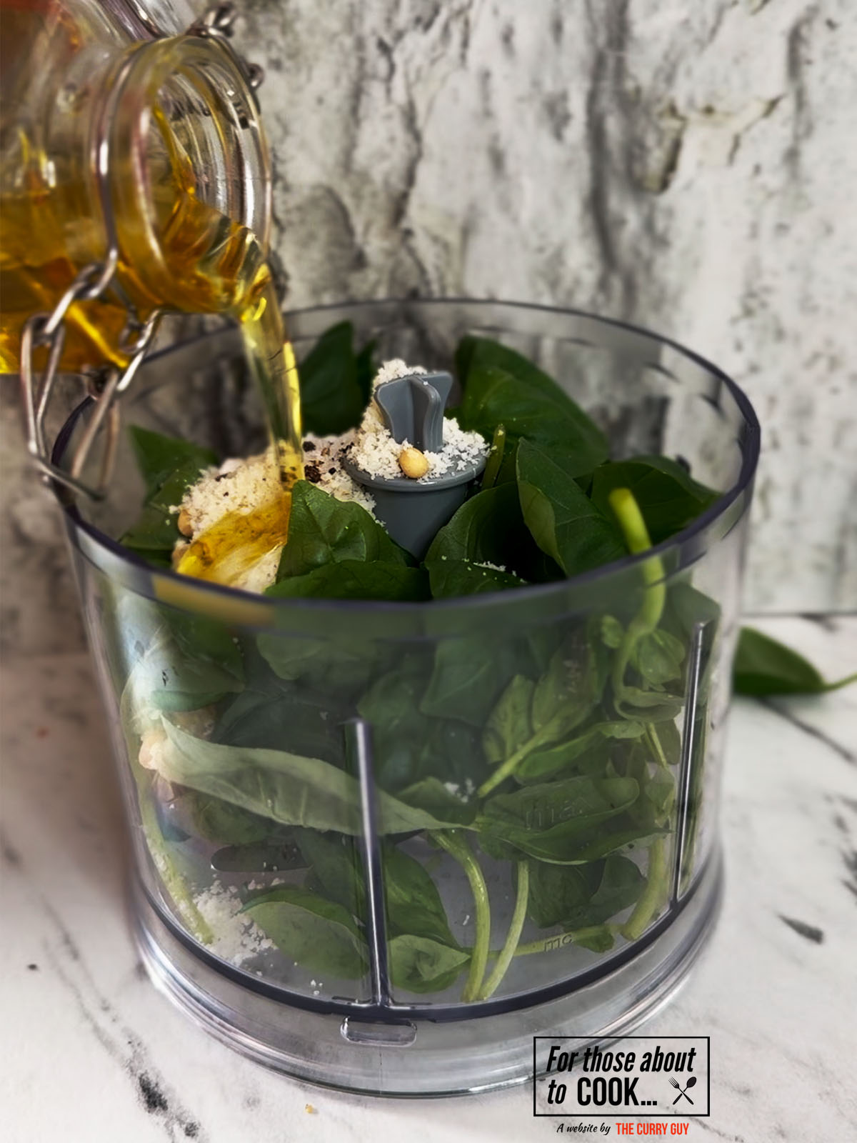 pesto ingredients in a food processor
