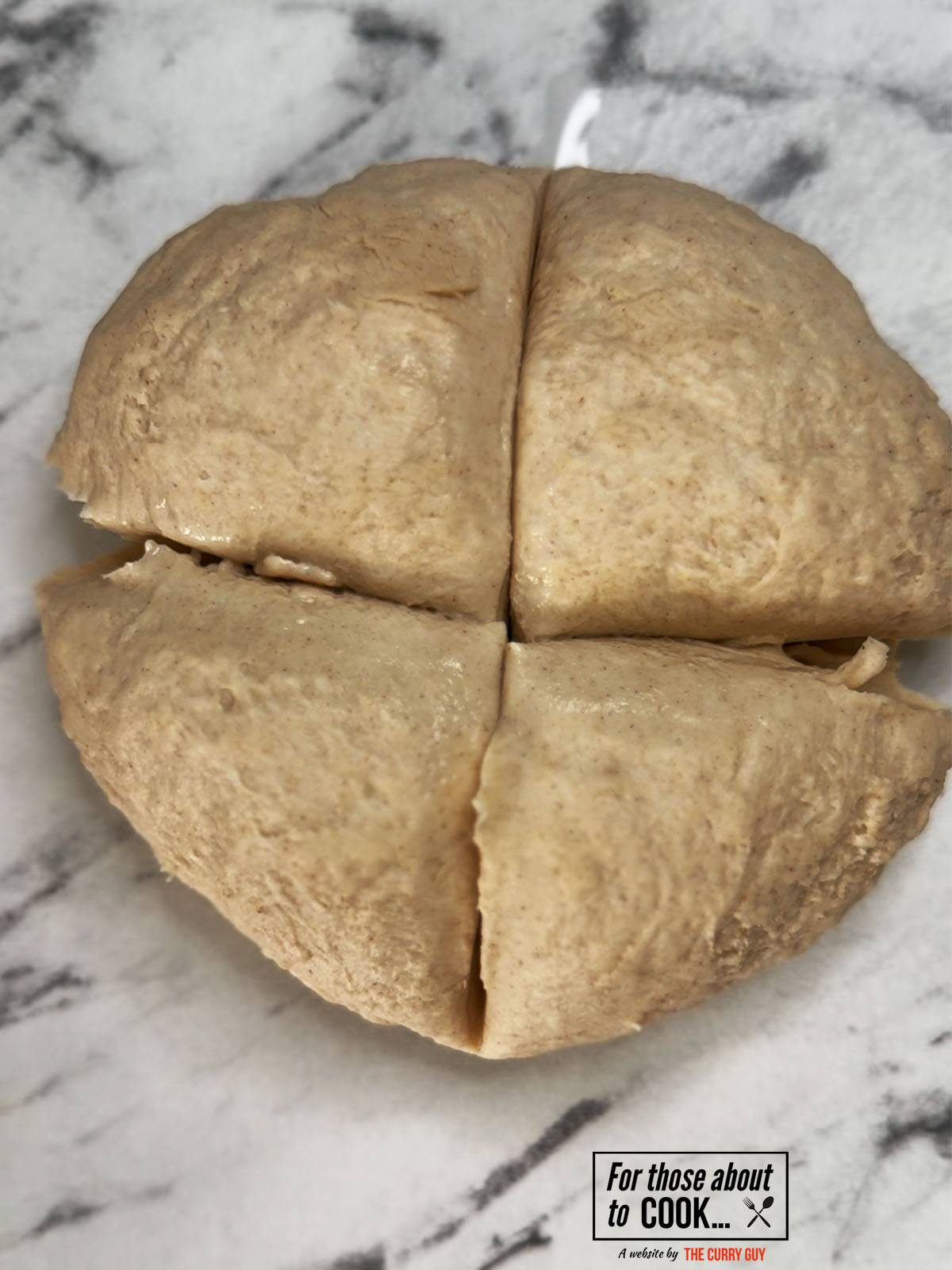 flatbread dough split into 4 equal pieces