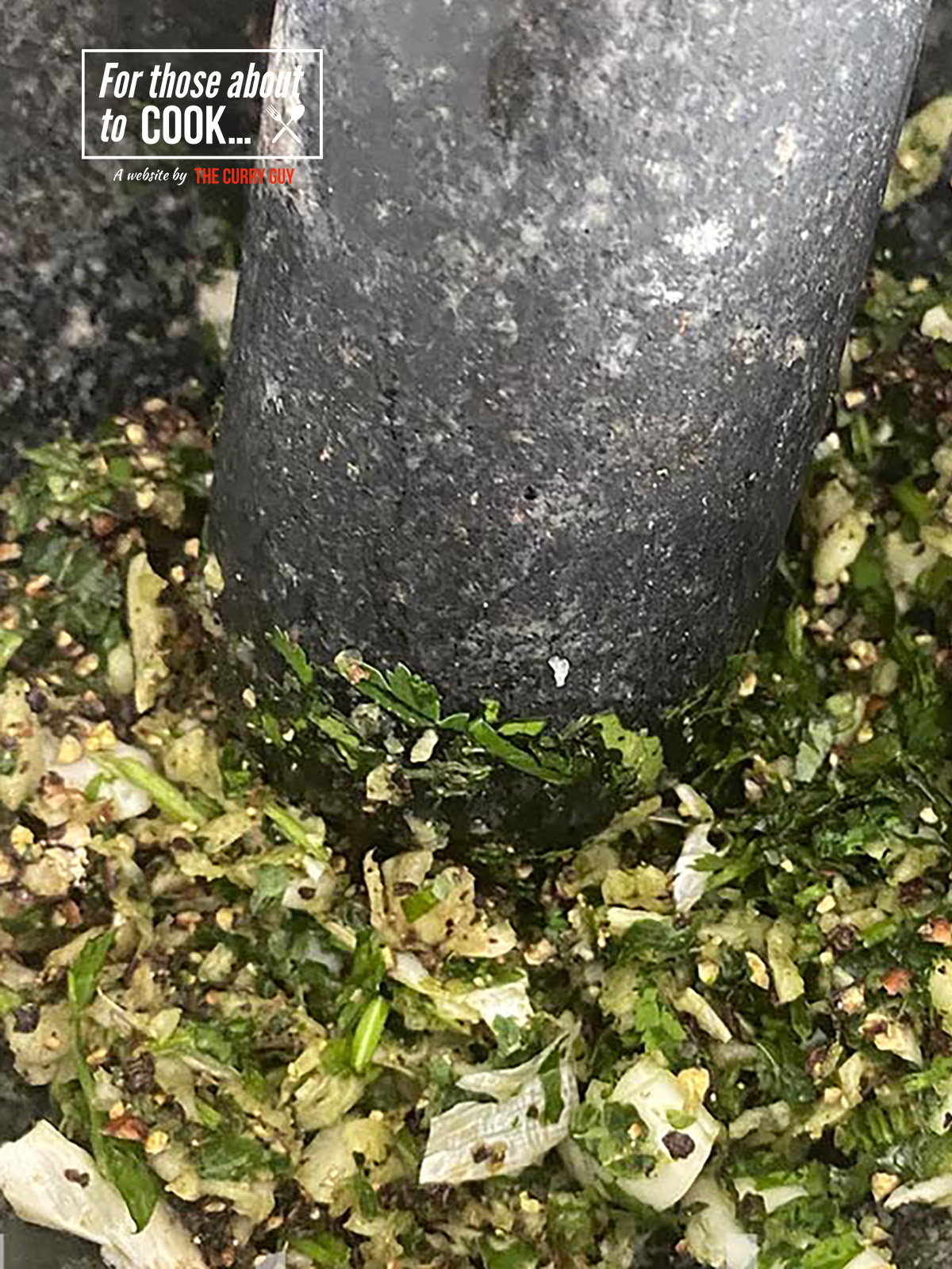 herbs and spices in pestle and mortar