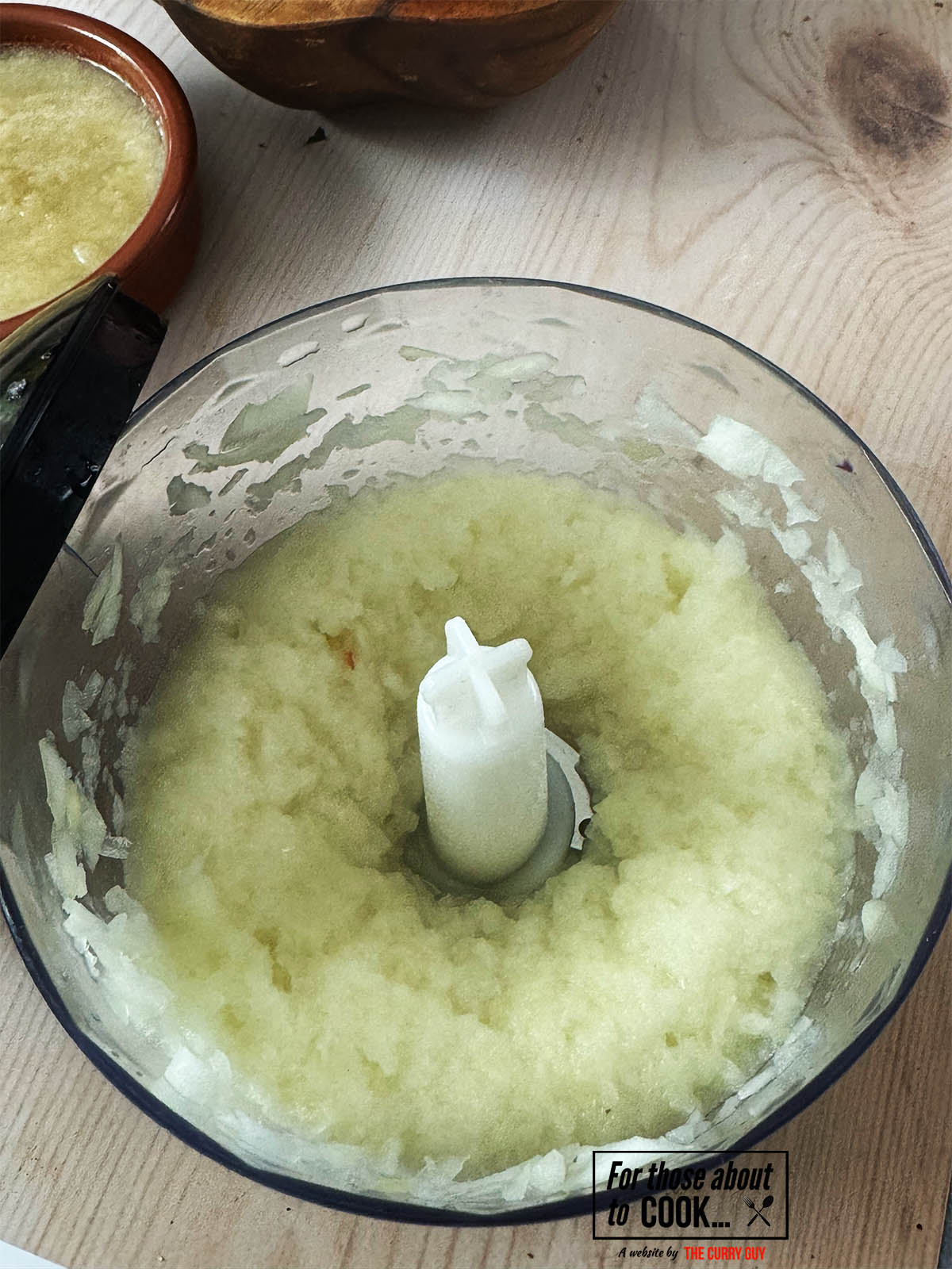 Blending the onions for the sauce.