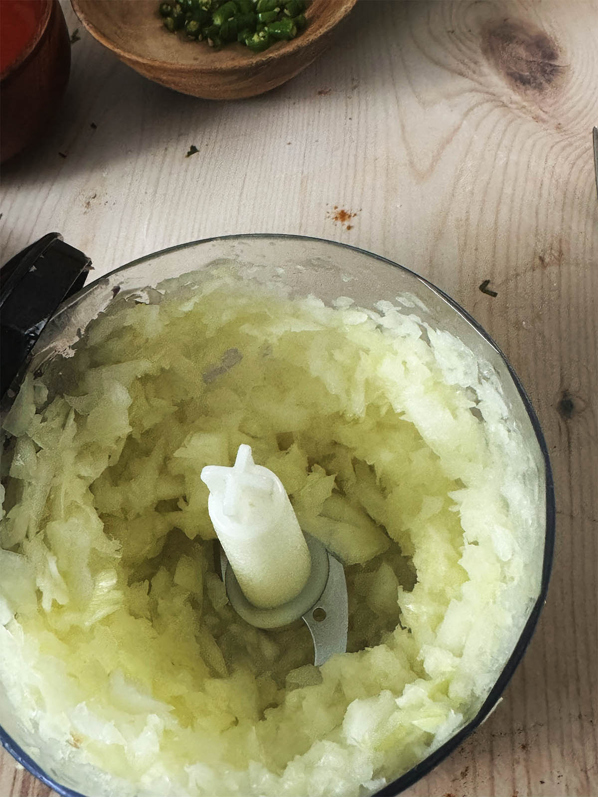 Blending the onions into a course paste.