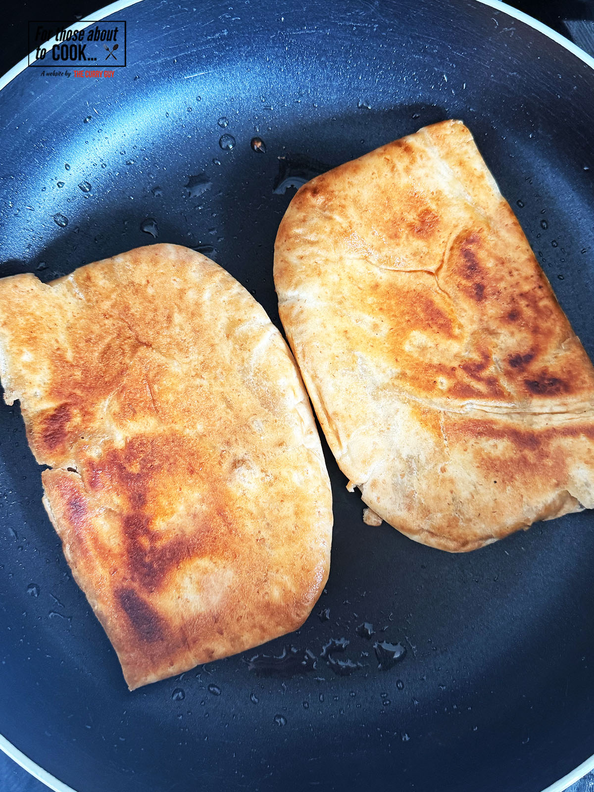 Arayes frying in a pan