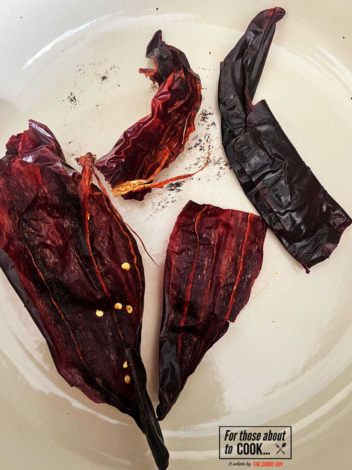 Chillies toasting in a pan