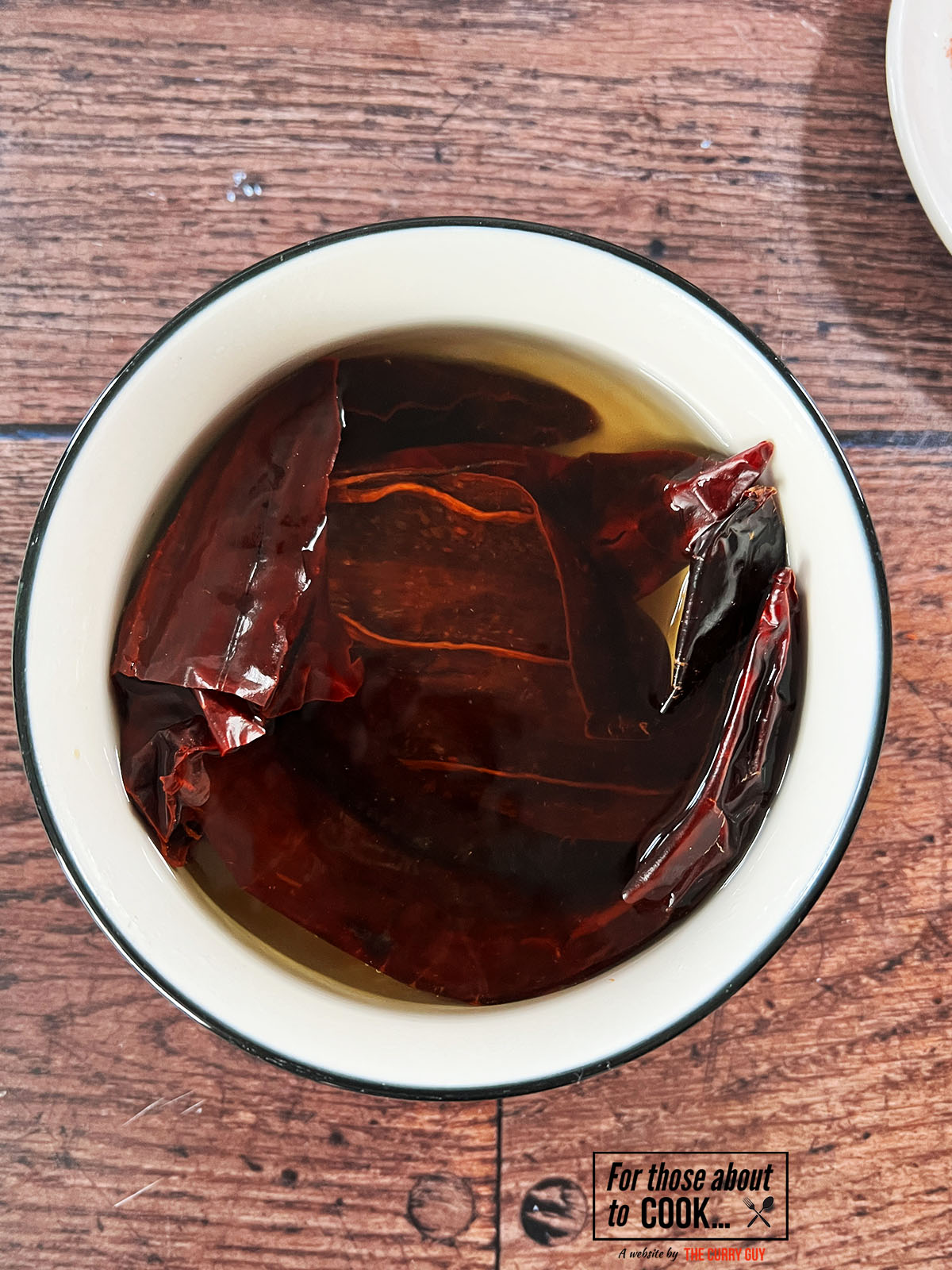 Chillies soaking in boiling water