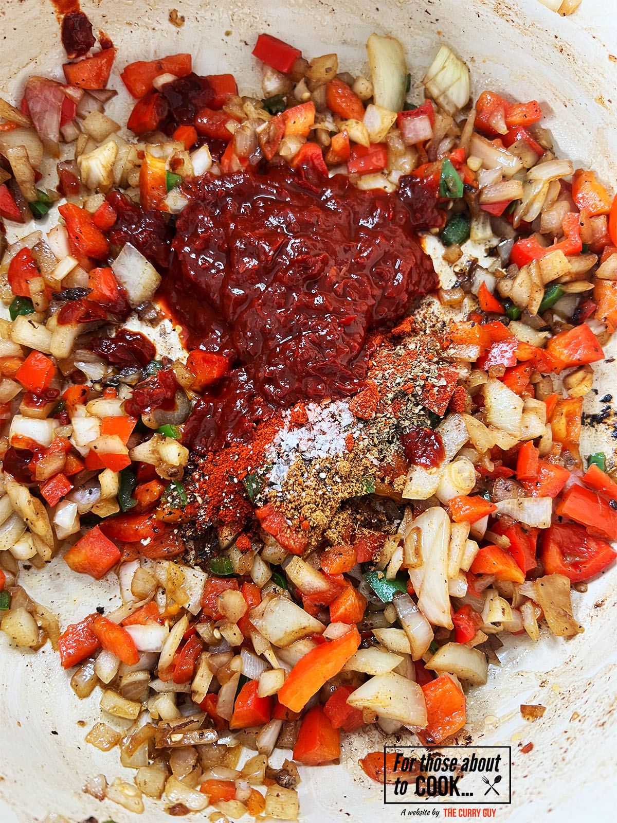 chili paste and soy sauce added to the pan and mixed