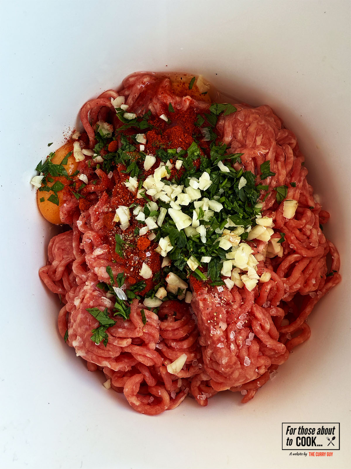 Meatball ingredients in a bowl ready to mix