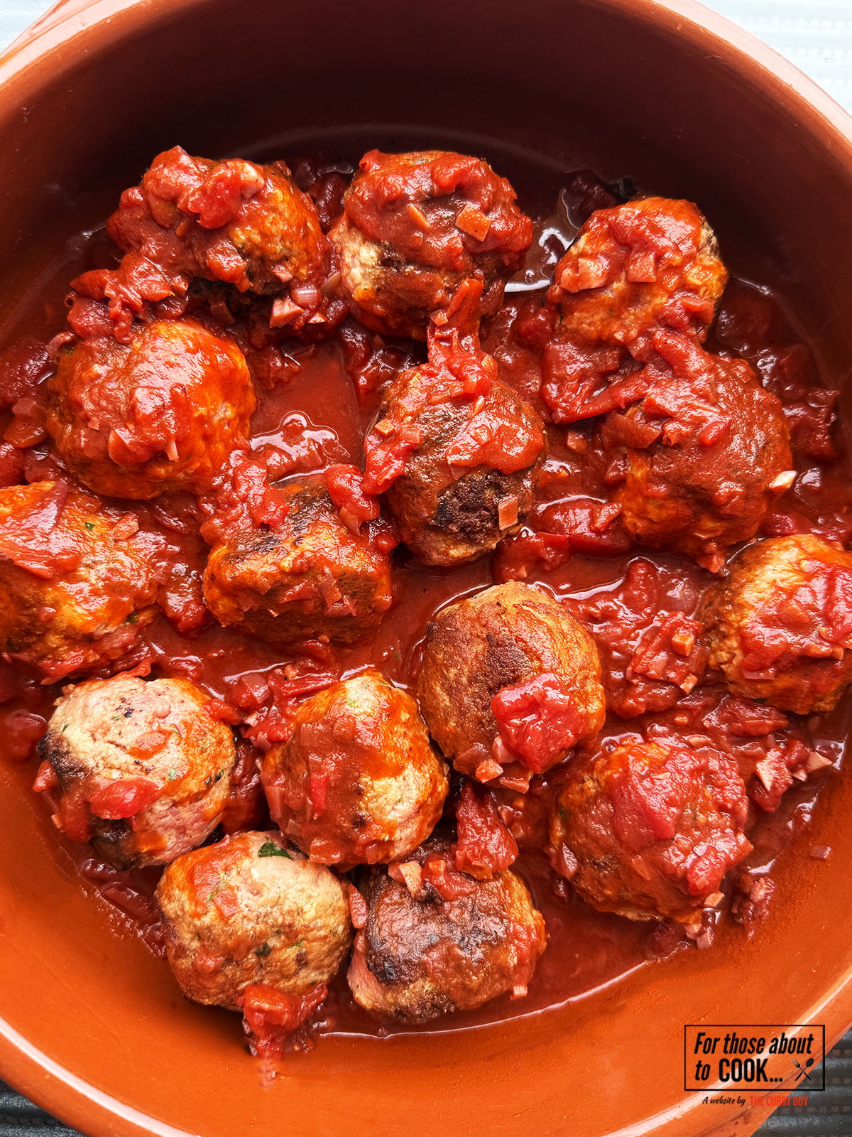 Meatballs covered in sauce 