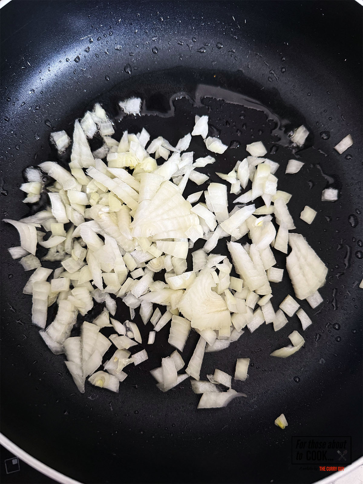 Onions frying in a pan