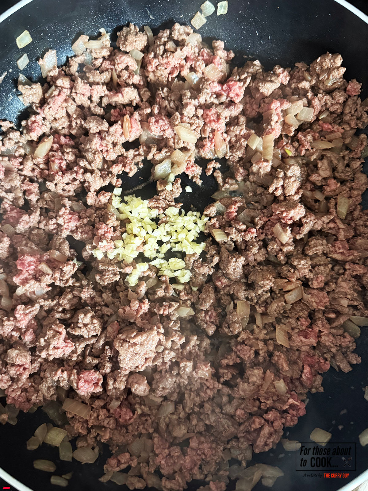 Garlic added to the pan