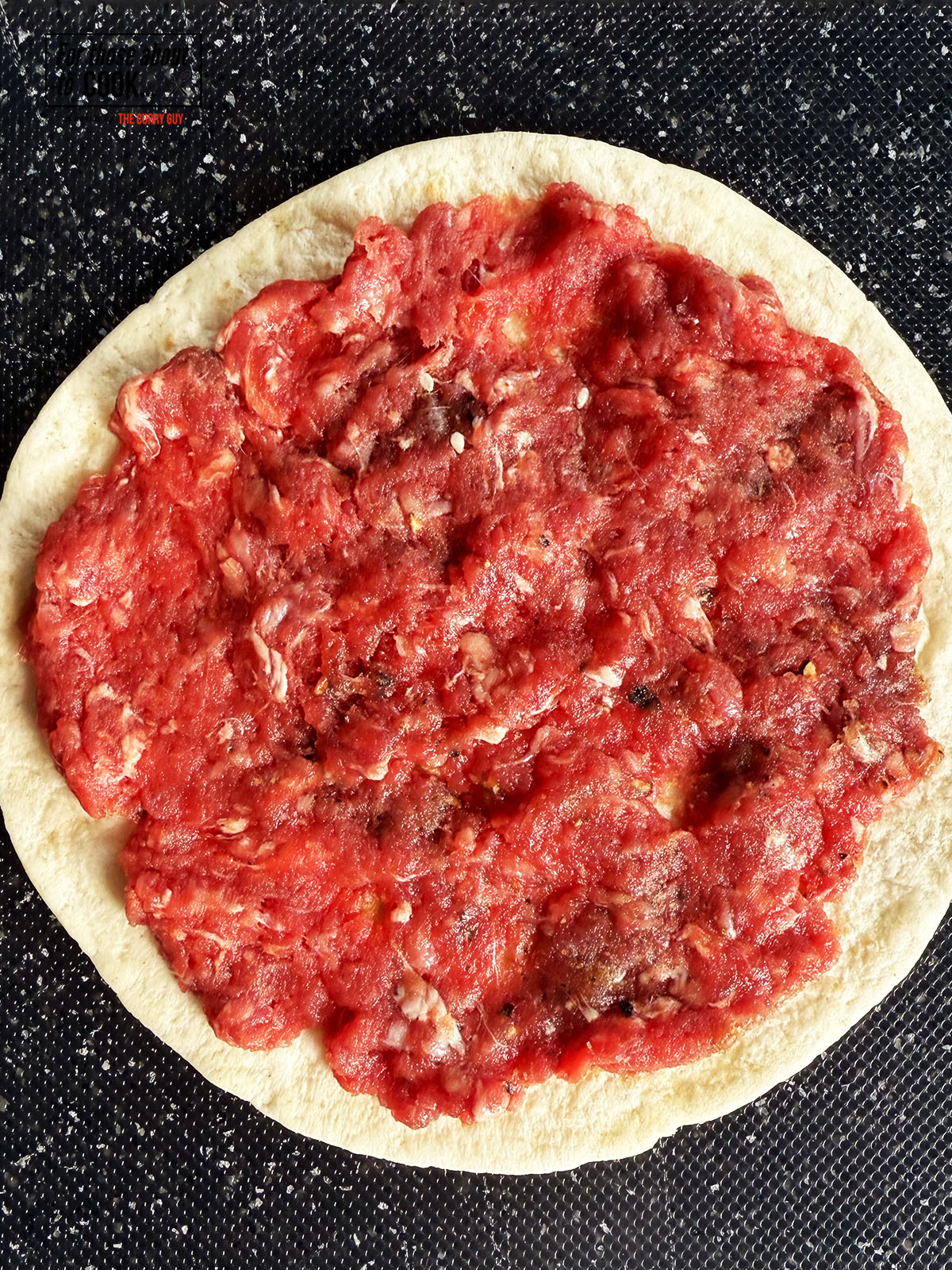 Minced beef spread out thinly