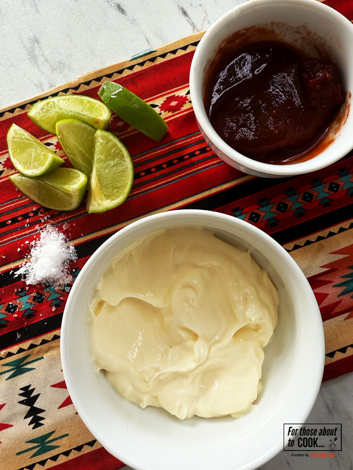 Ingredients for chipotle mayo separated into dishes