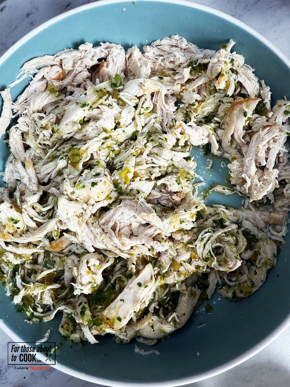 Salsa verde and chicken mixed together