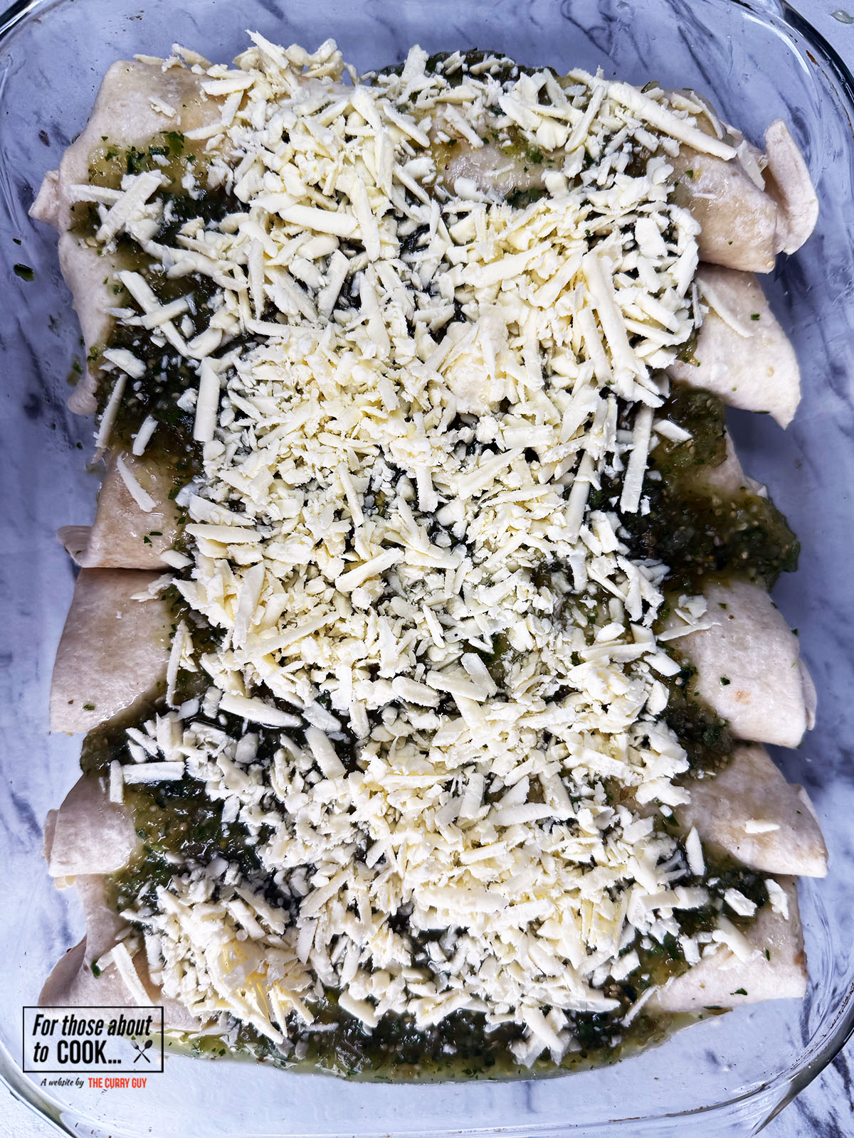 Enchiladas verdes smothered in cheese