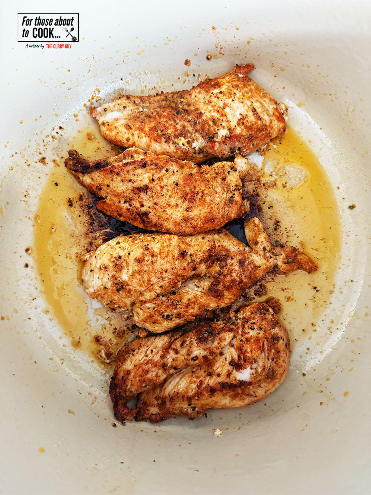 Chicken browning in a pan