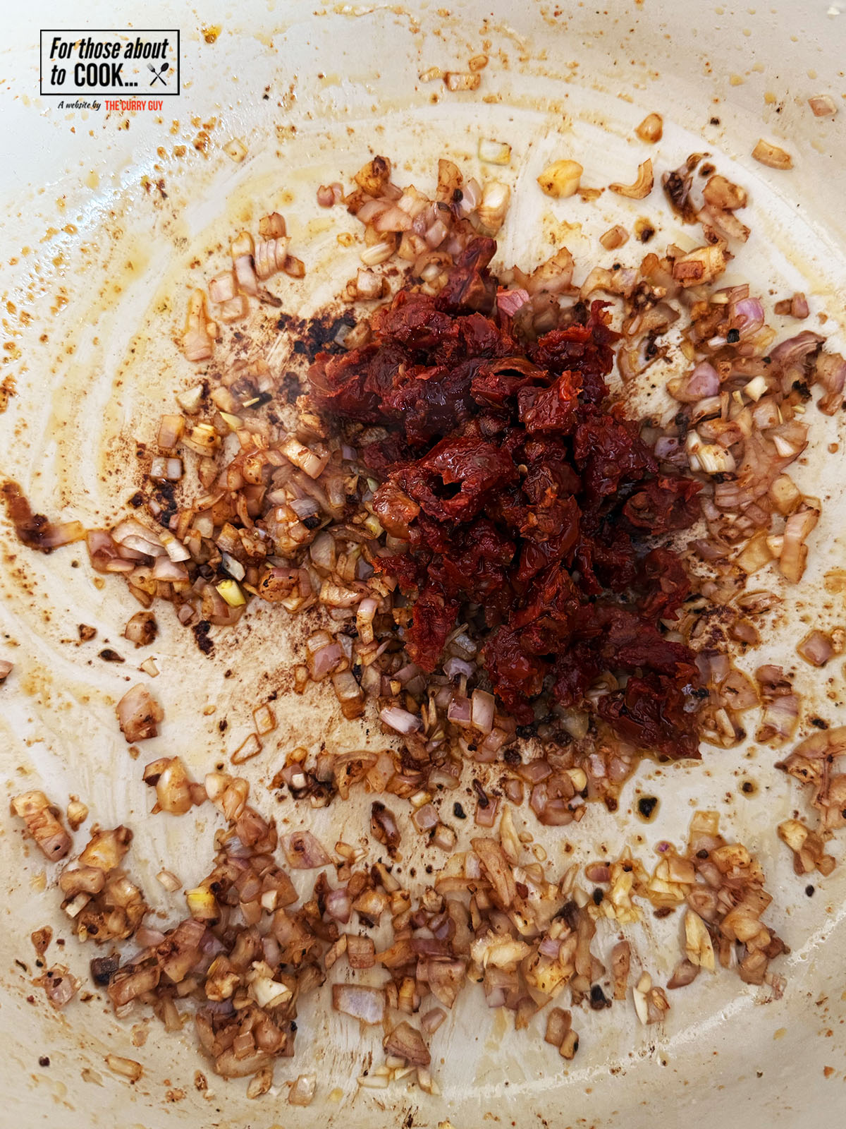 Sundried tomatoes added to the pan and fried