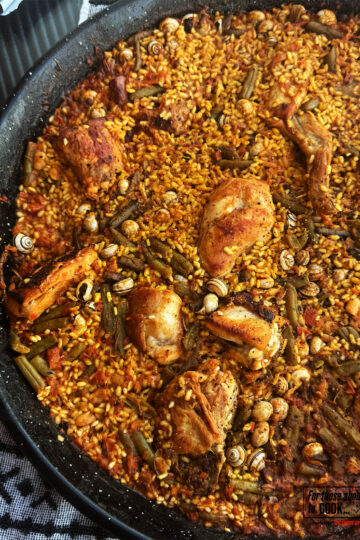 Paella Valenciana in a paella pan.