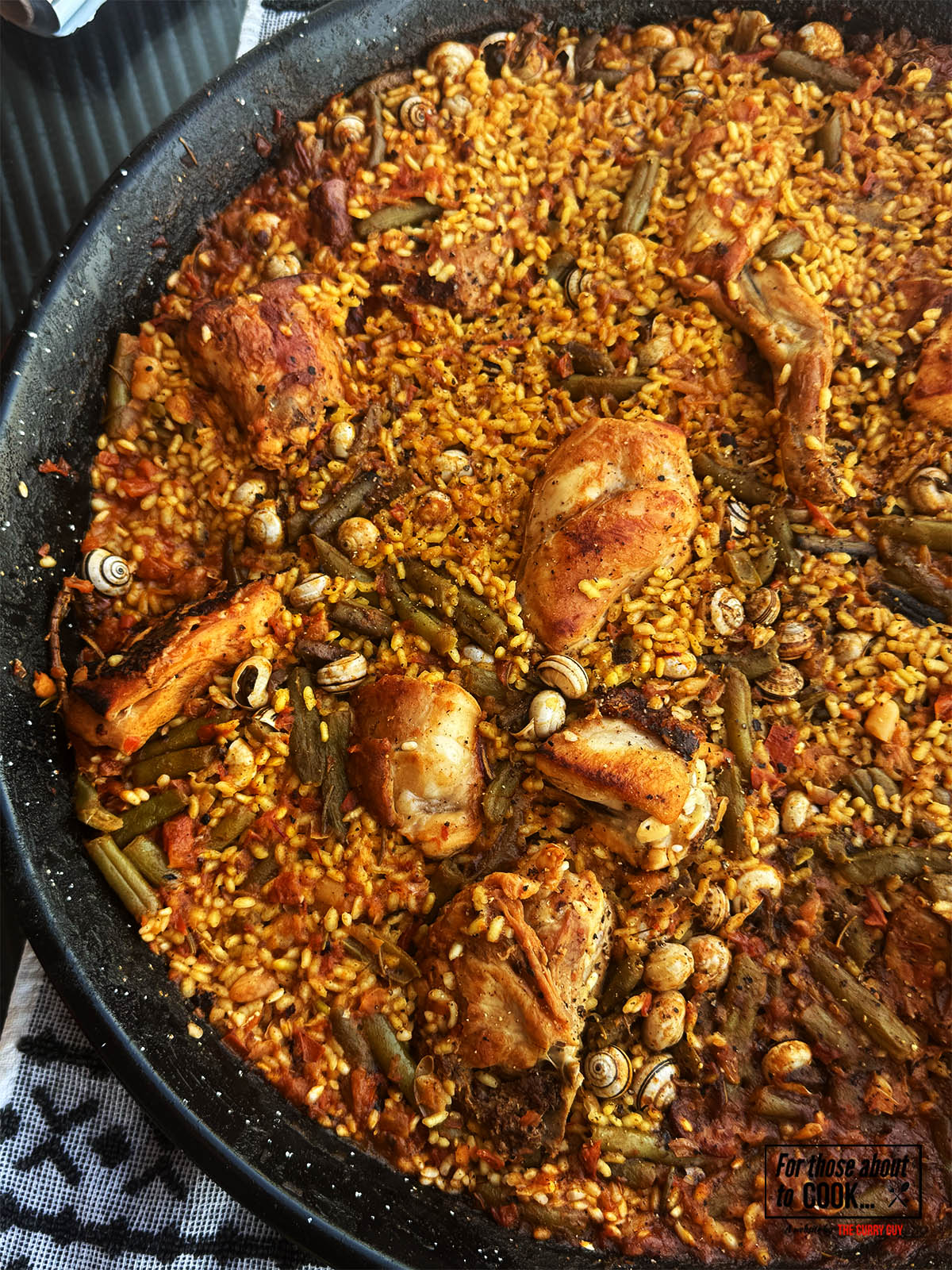 Paella Valenciana in a paella pan.
