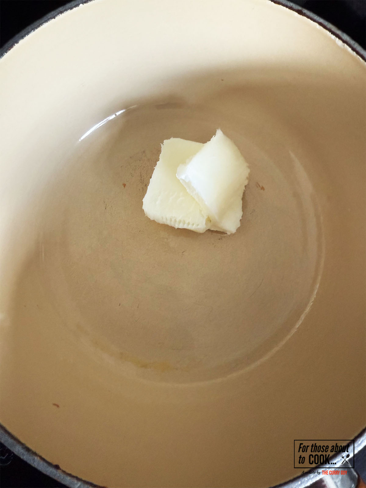 melting lard in a pan 