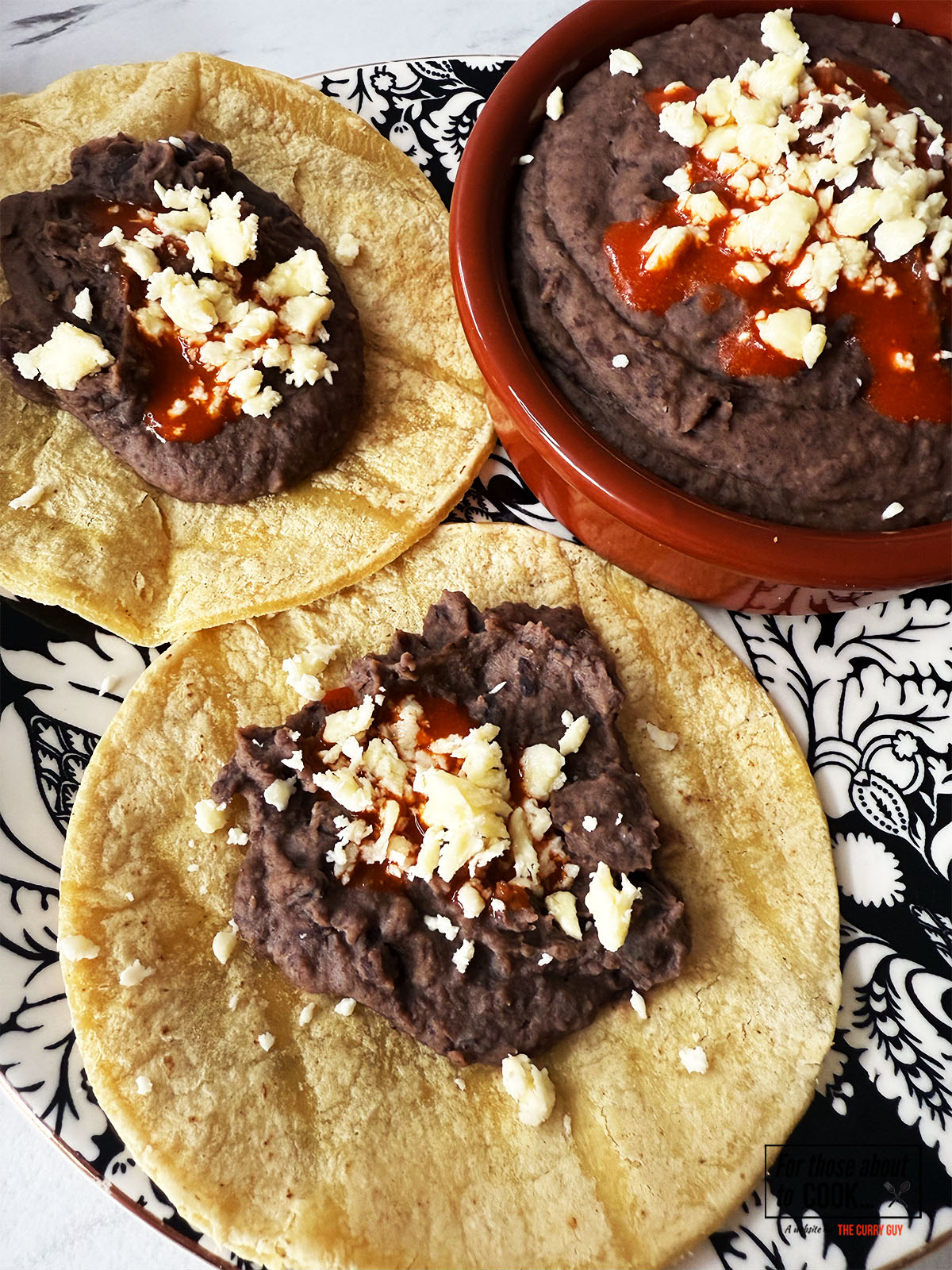 Refried black bean tacos