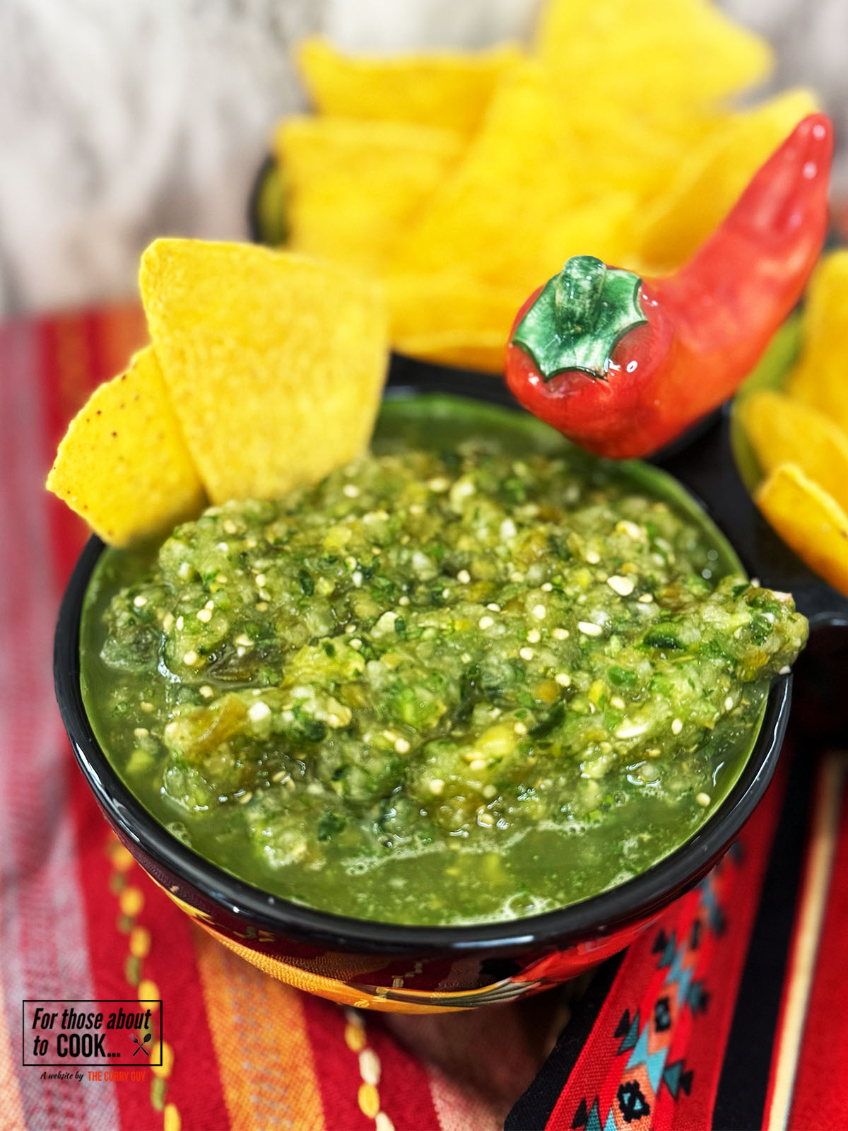Salsa Verde served in a bowl with tortilla chips