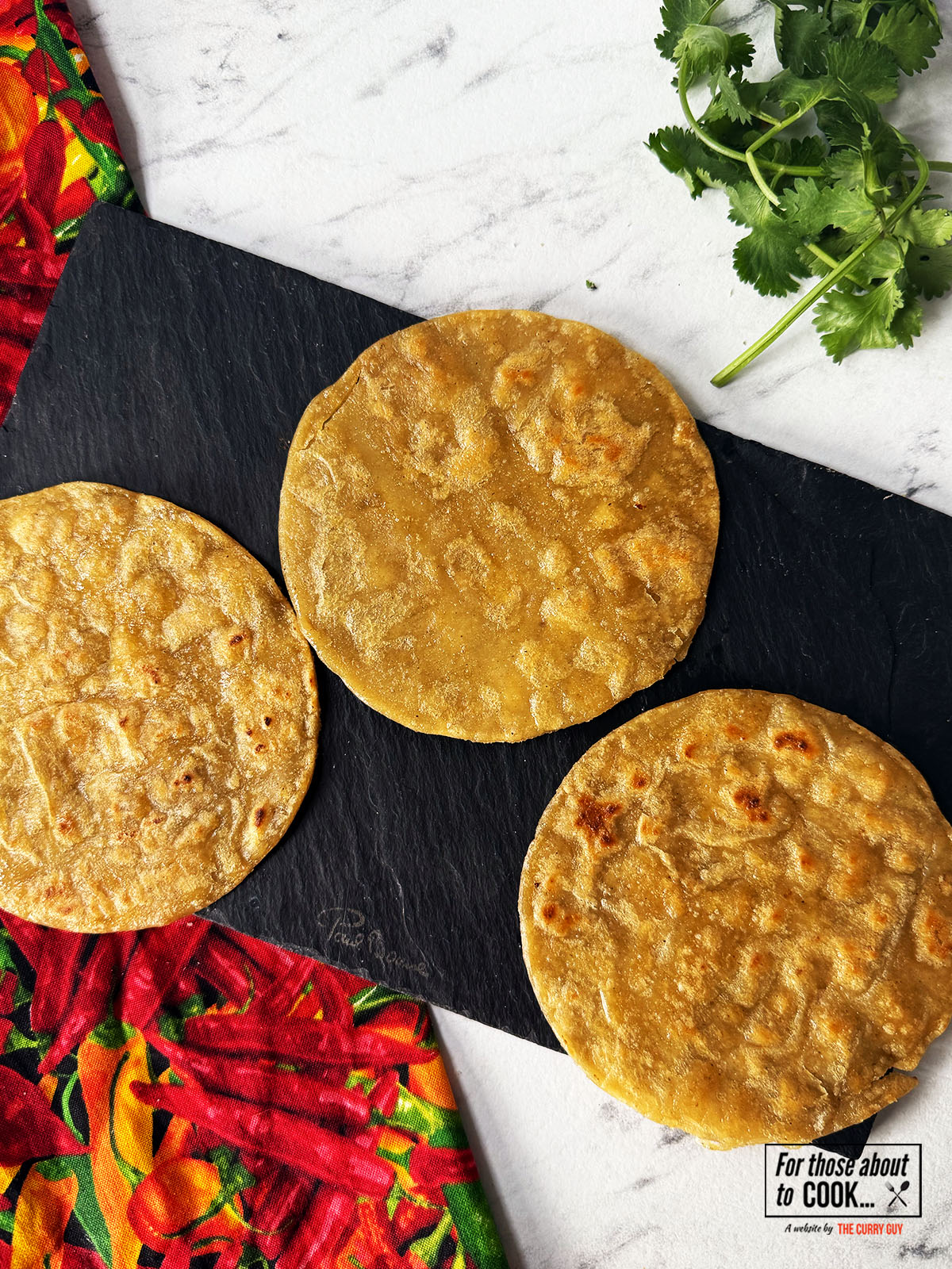 Crispy tortillas displayed on a slate
