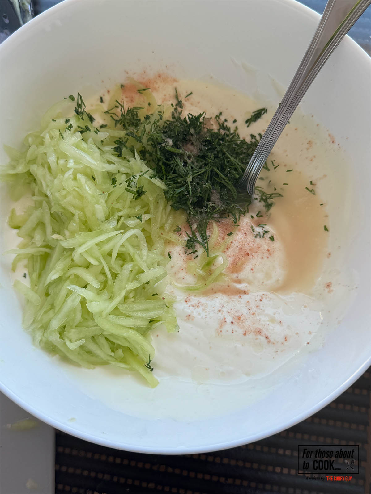 Adding all the ingredients except for the olive oil to a mixing bowl.