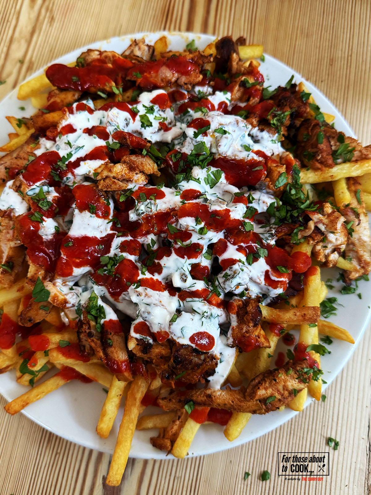 chicken loaded fries plated up