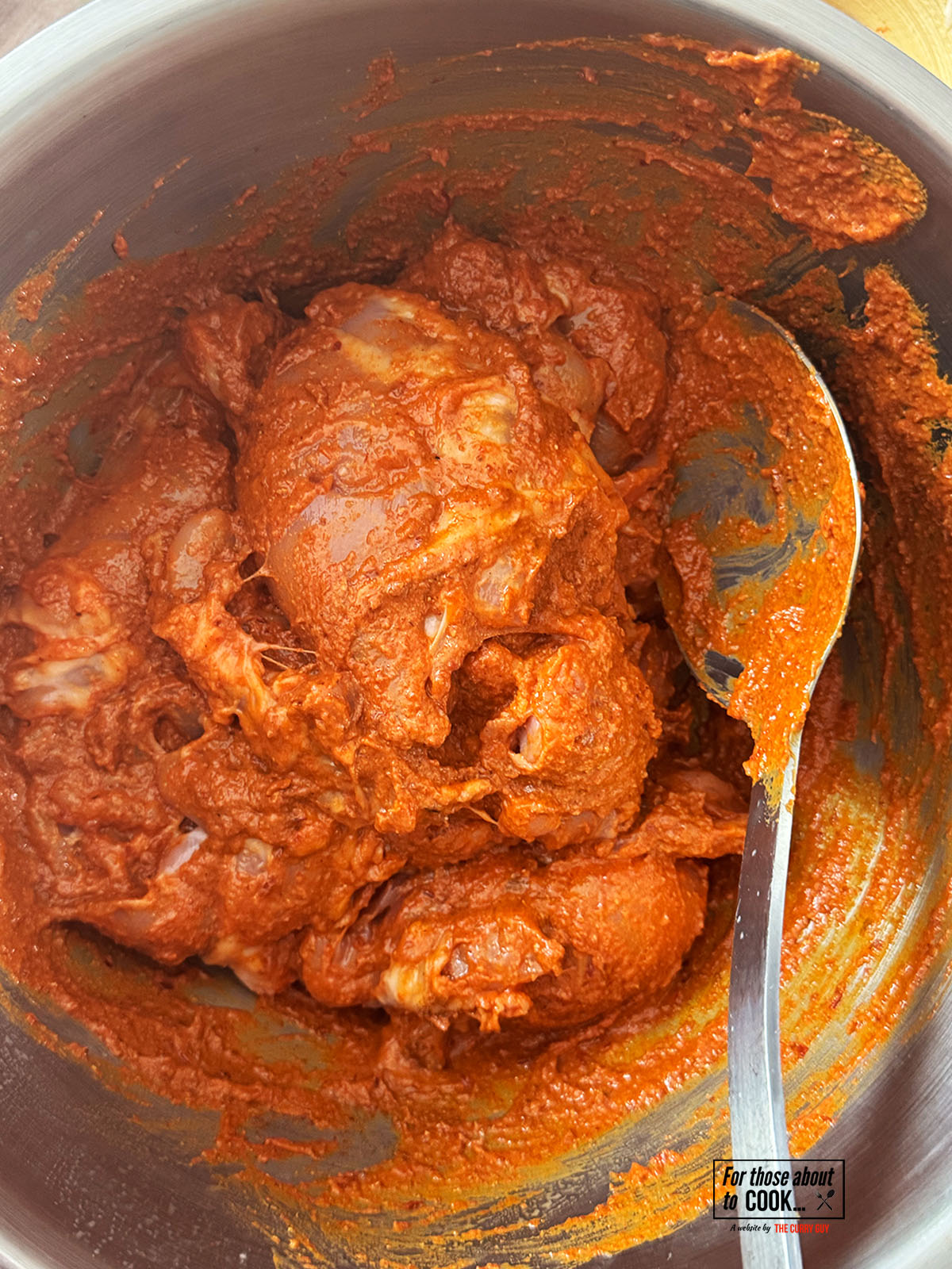 adding the chicken to the marinade