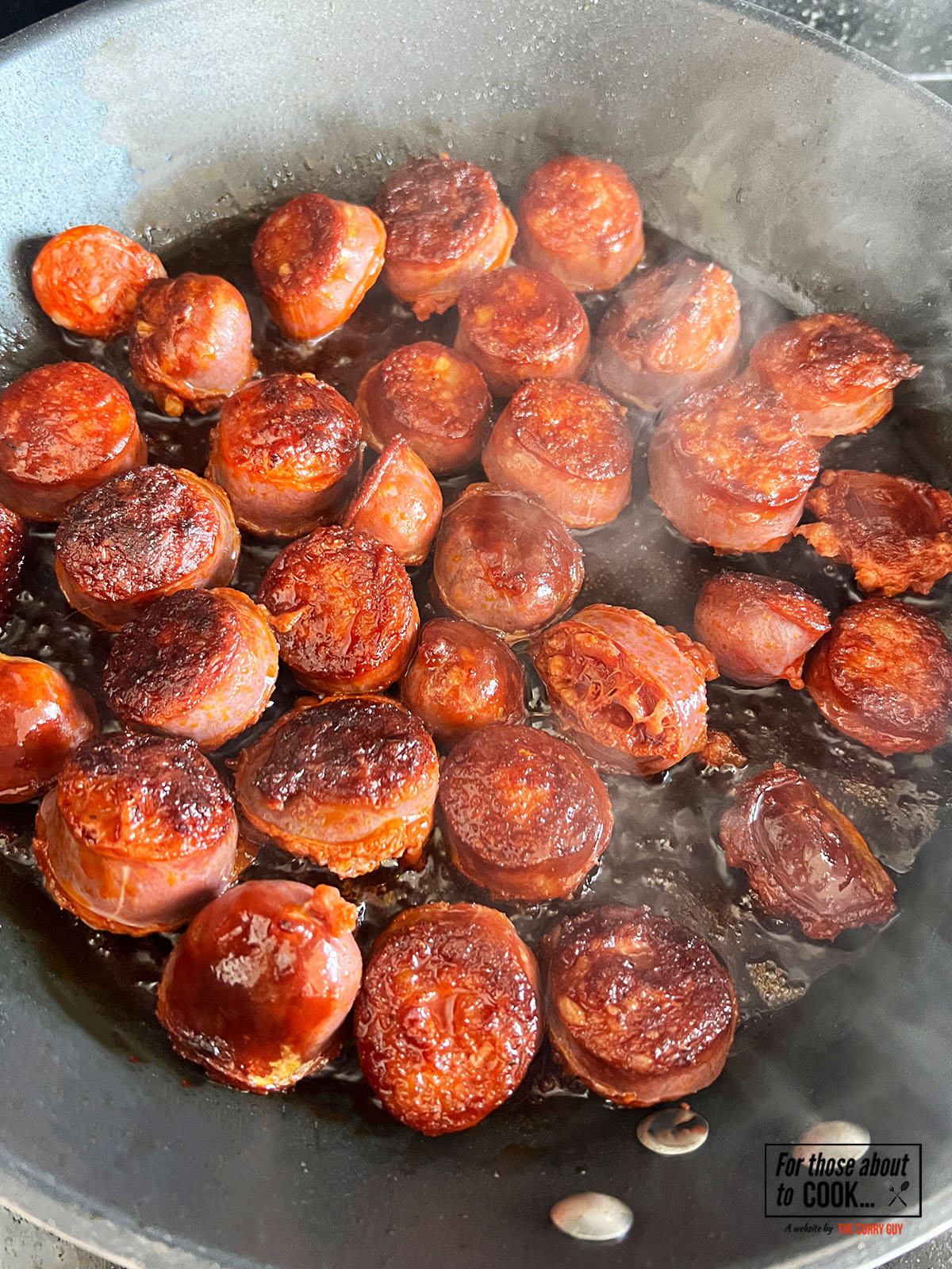 Chorizo browning in a pan