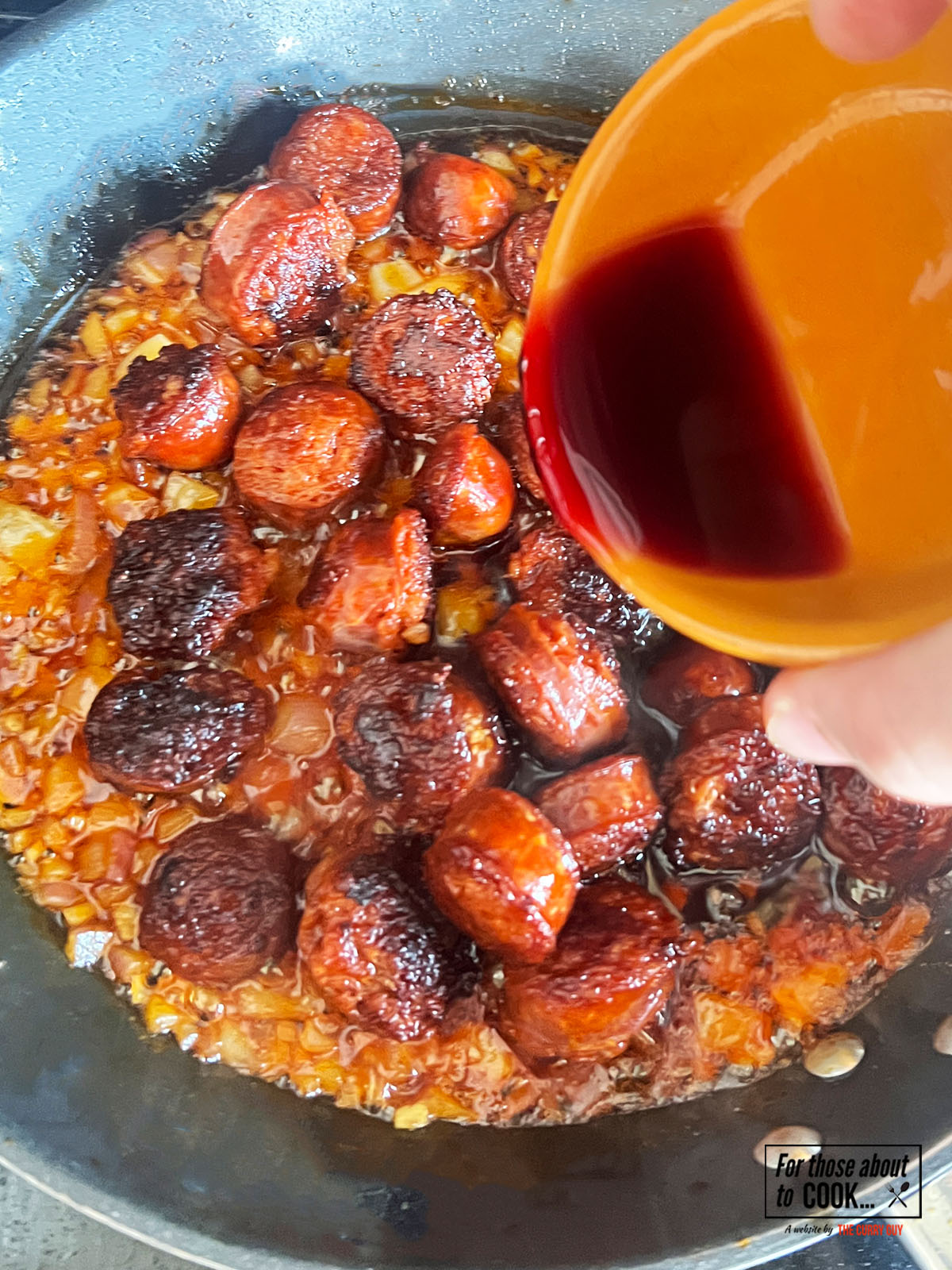 Honey and red wine added to the pan