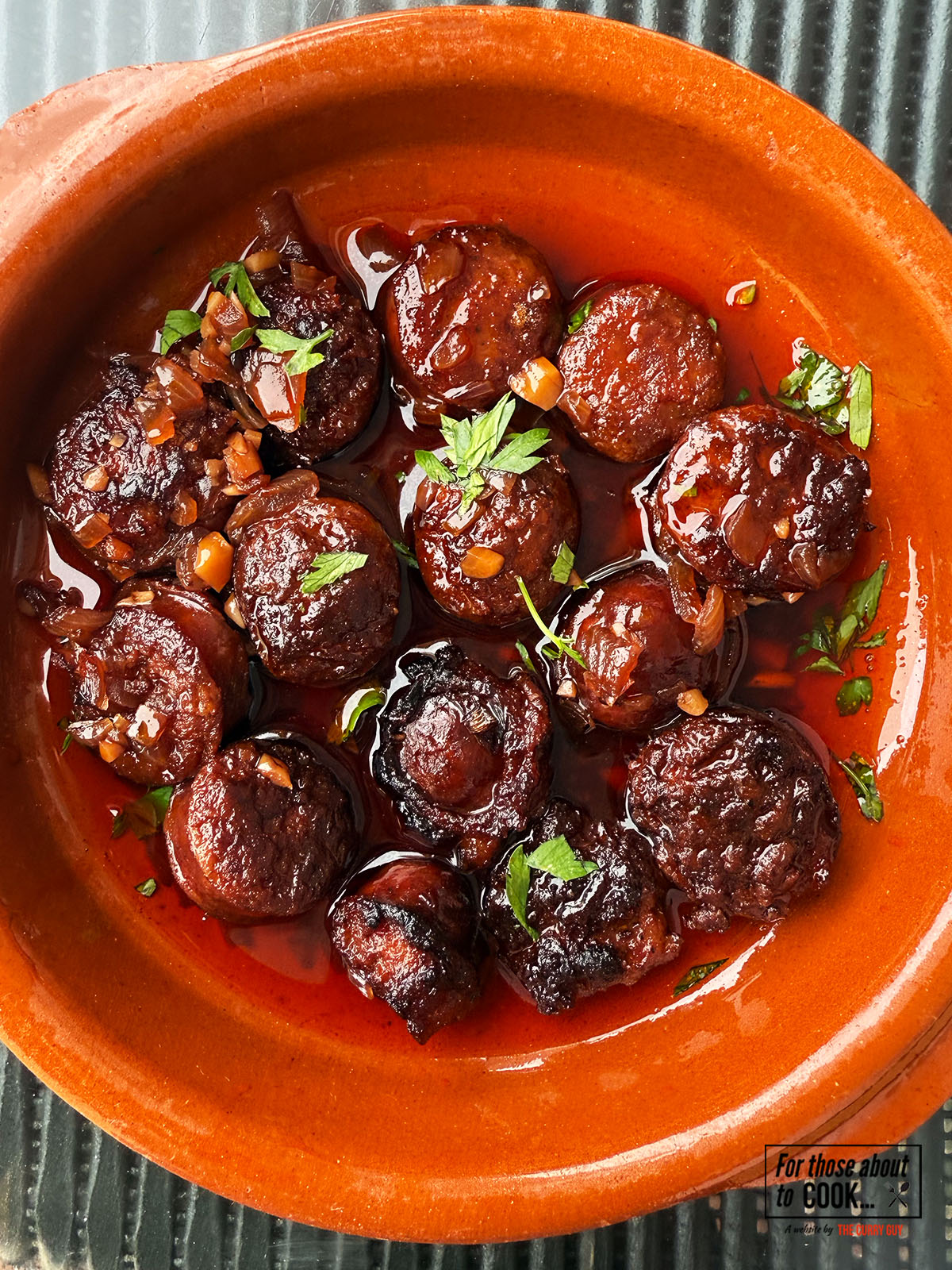 Chorizo Al vino served in a tapas dish