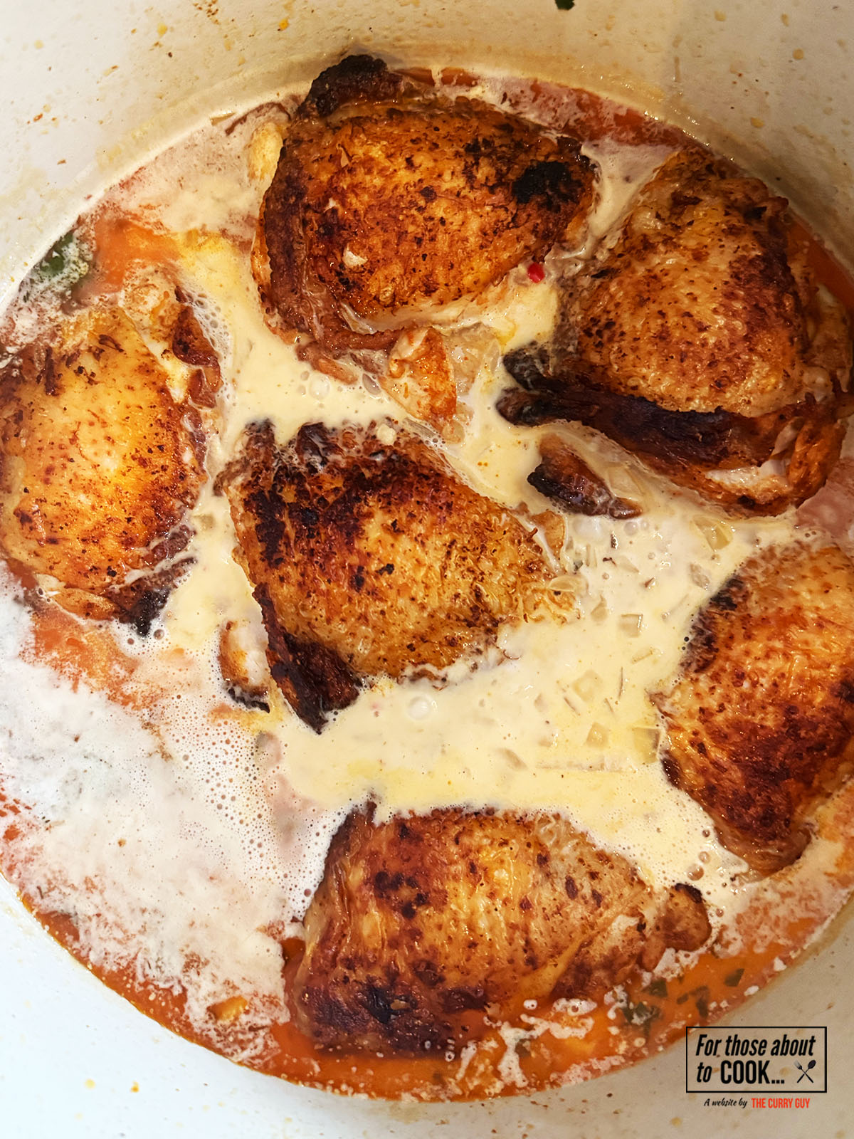 Crispy chicken added to the coconut broth