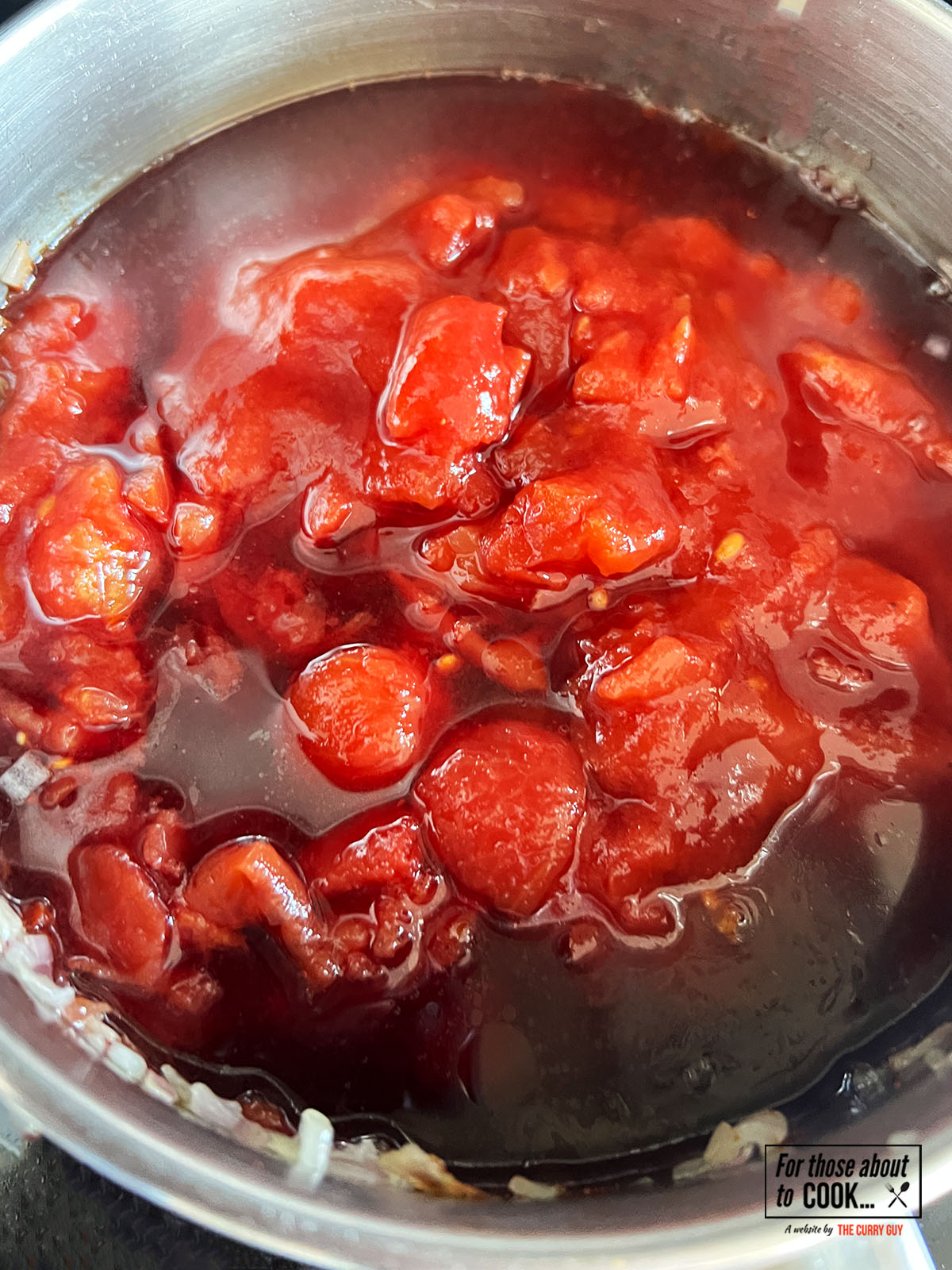 Tinned tomatoes added for the spicy sauce 