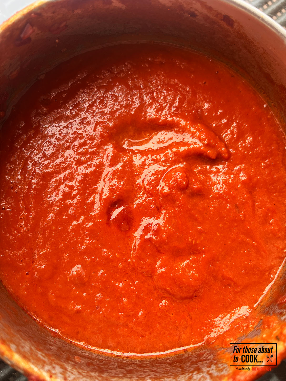 Spicy tomato sauce in a bowl ready to serve with patatas bravas