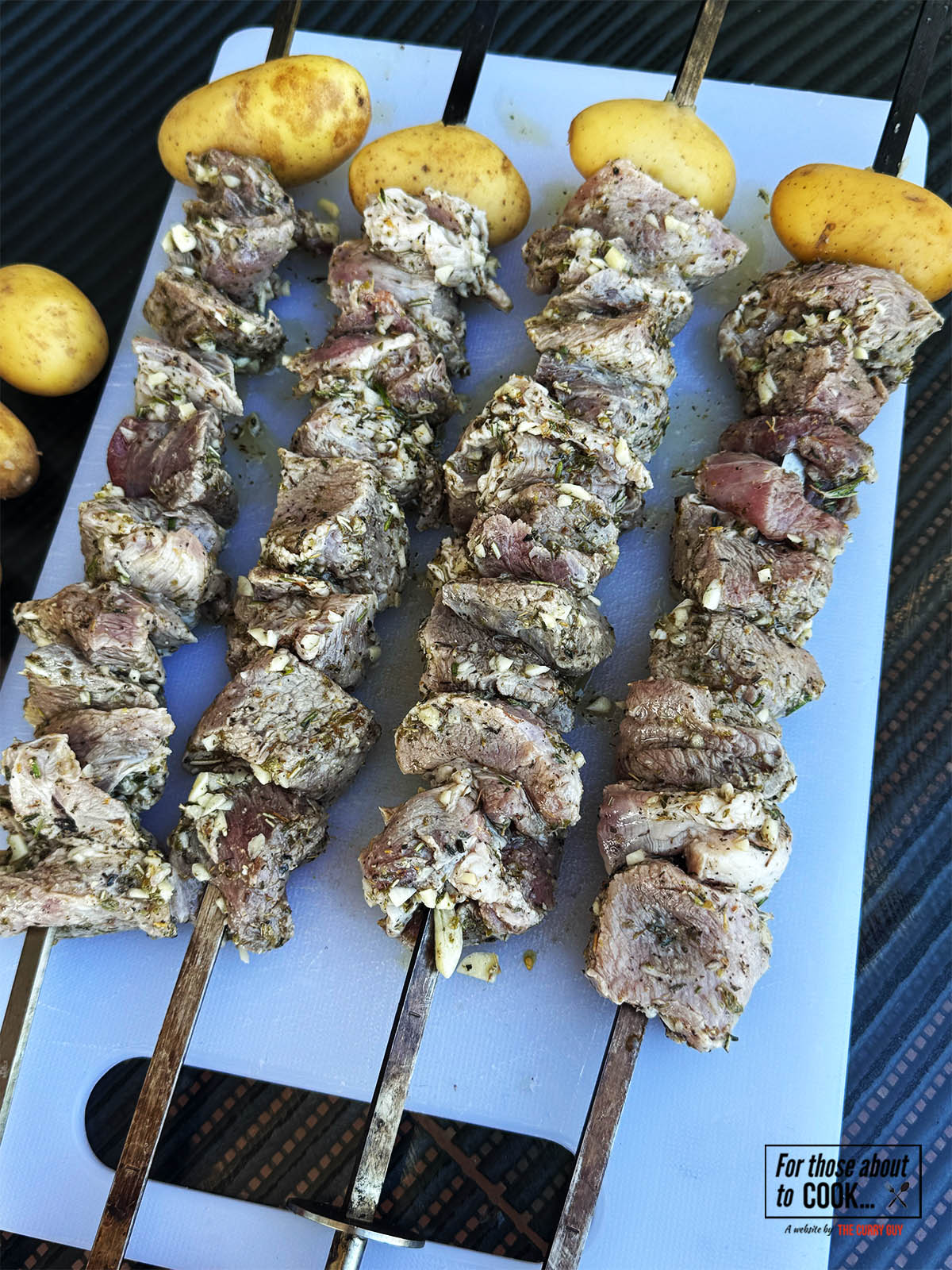 The pork skewered and ready to start cooking.