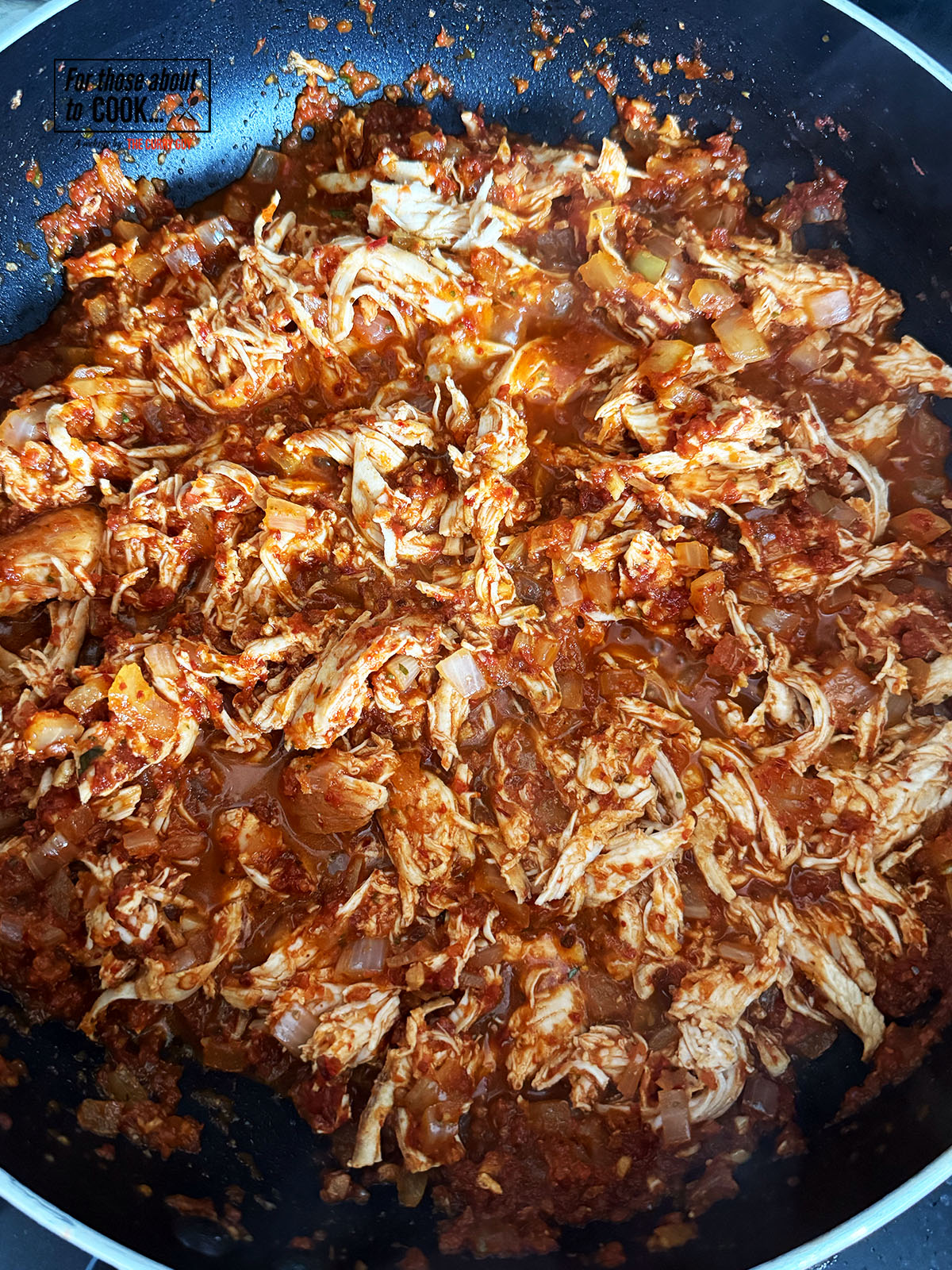 shredded chicken added to the sauce