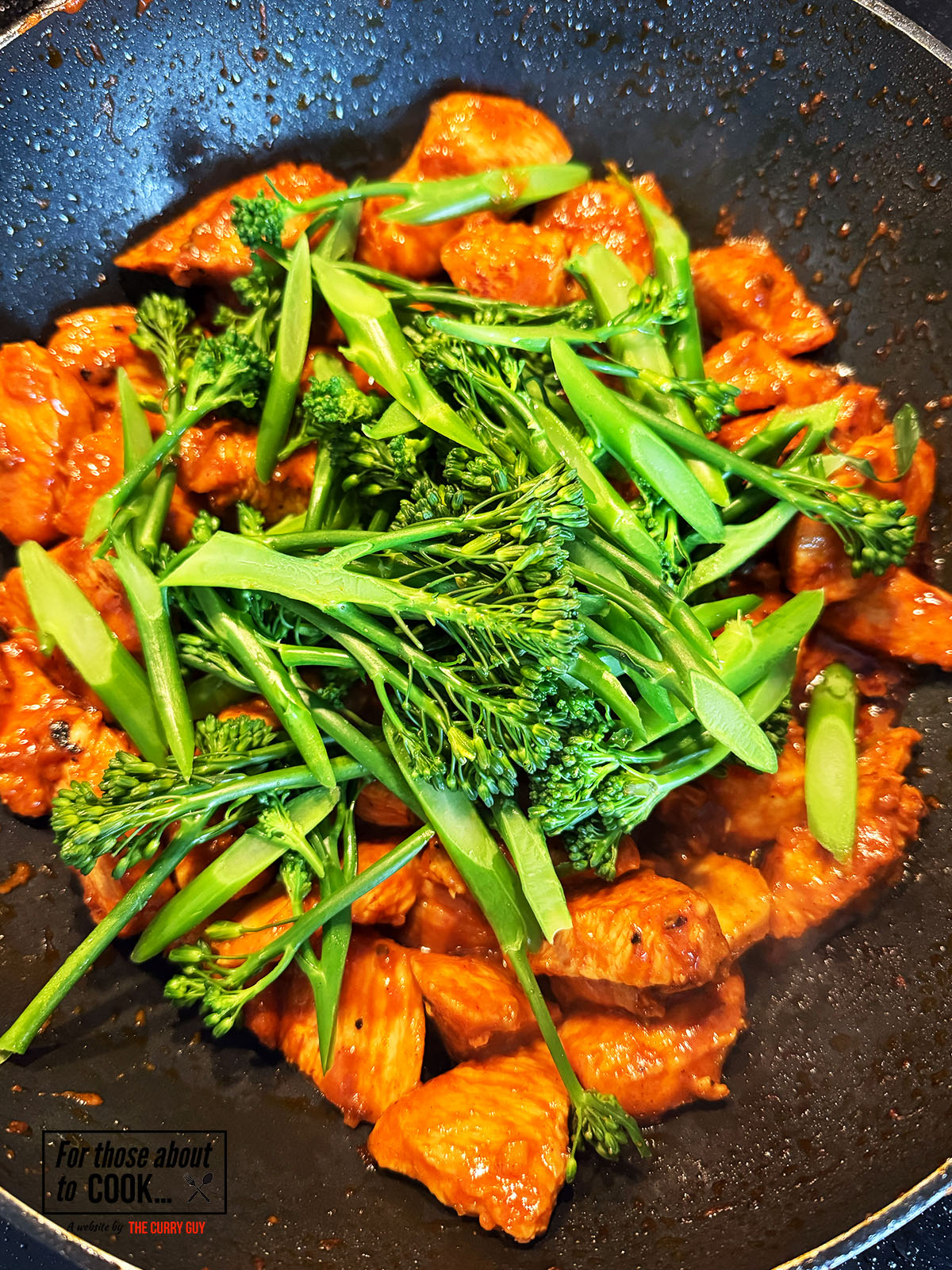 Broccoli added to the cooked chicken