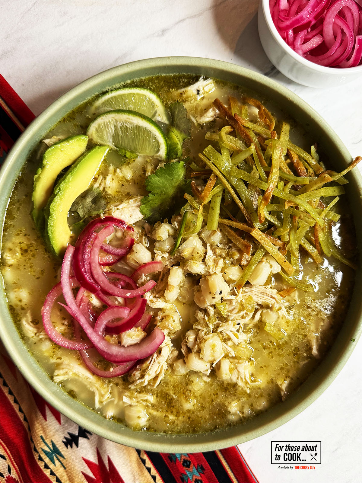 serving up the pozole verde